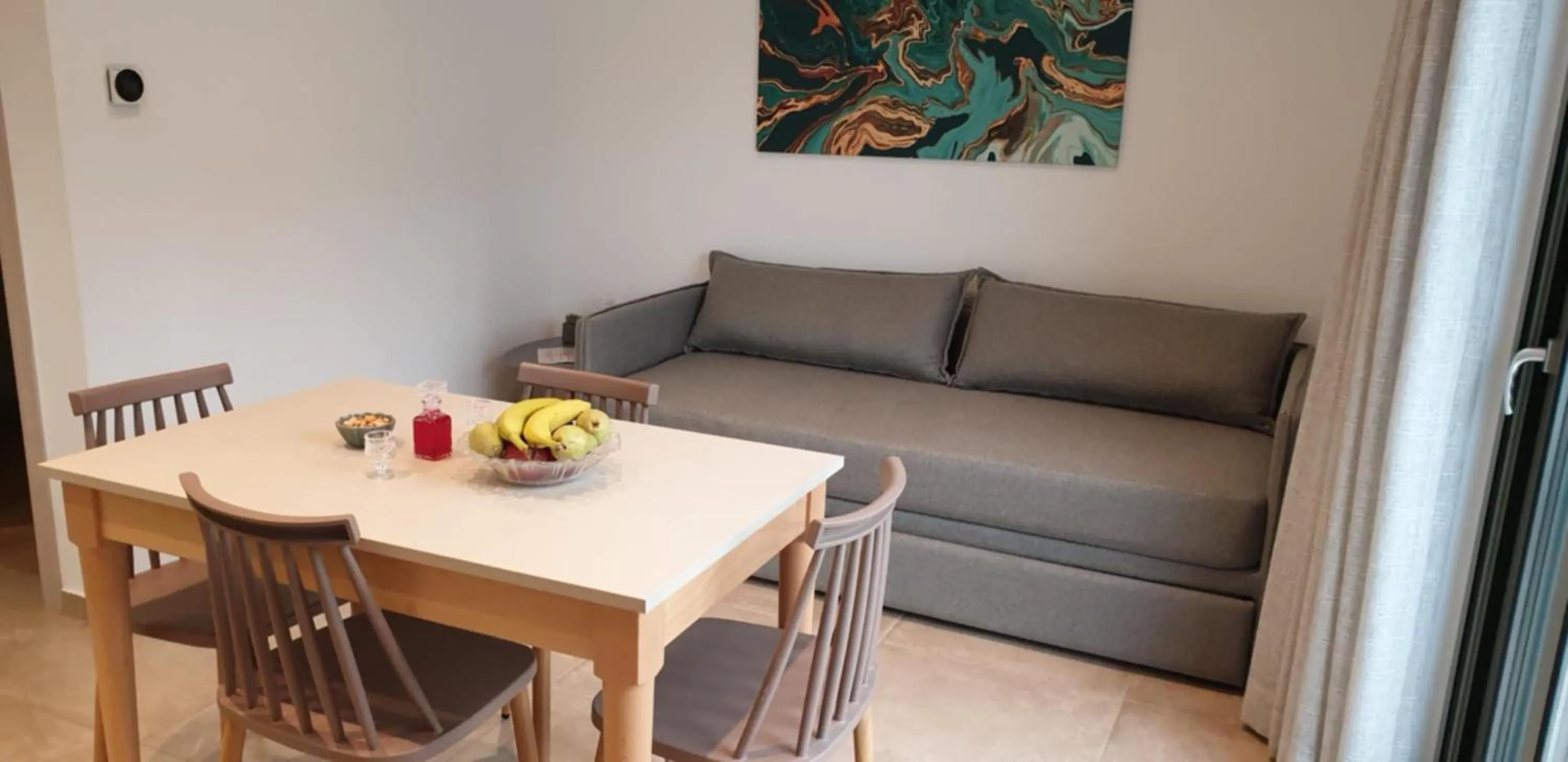 Seating area in Evriali Comfort Living