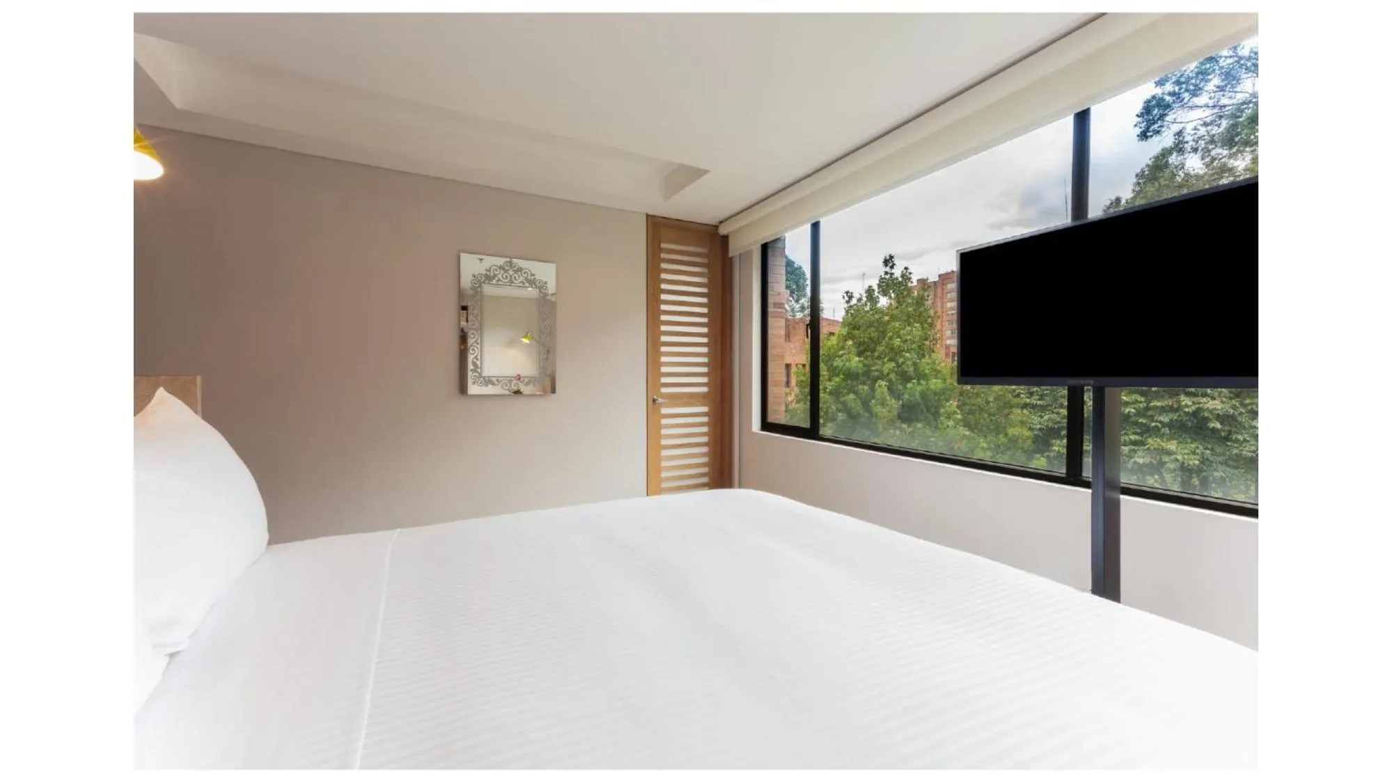 Photo of the whole room, Bed in Mika Suites