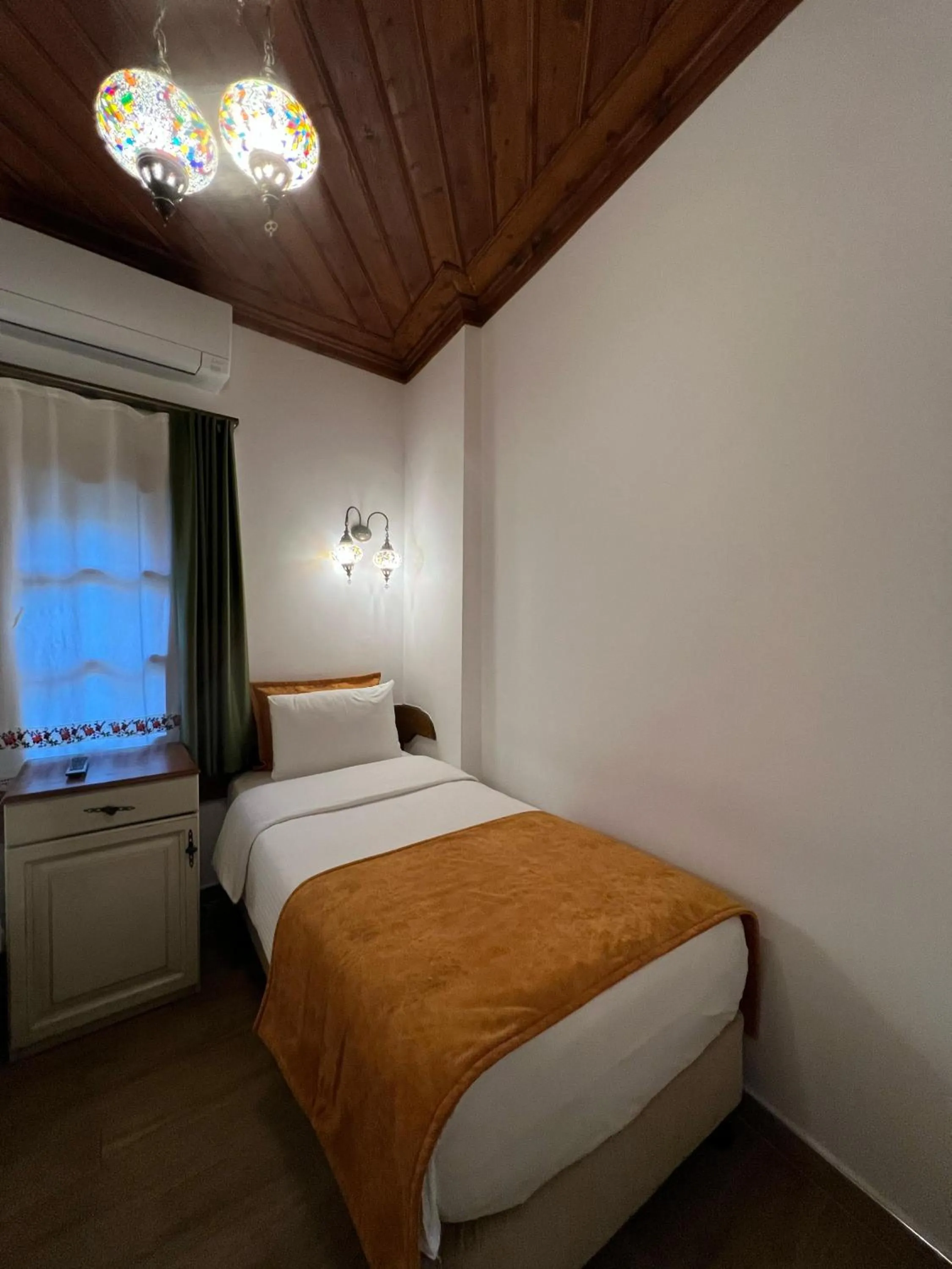 Bed in White Garden Hotel-Adult Only
