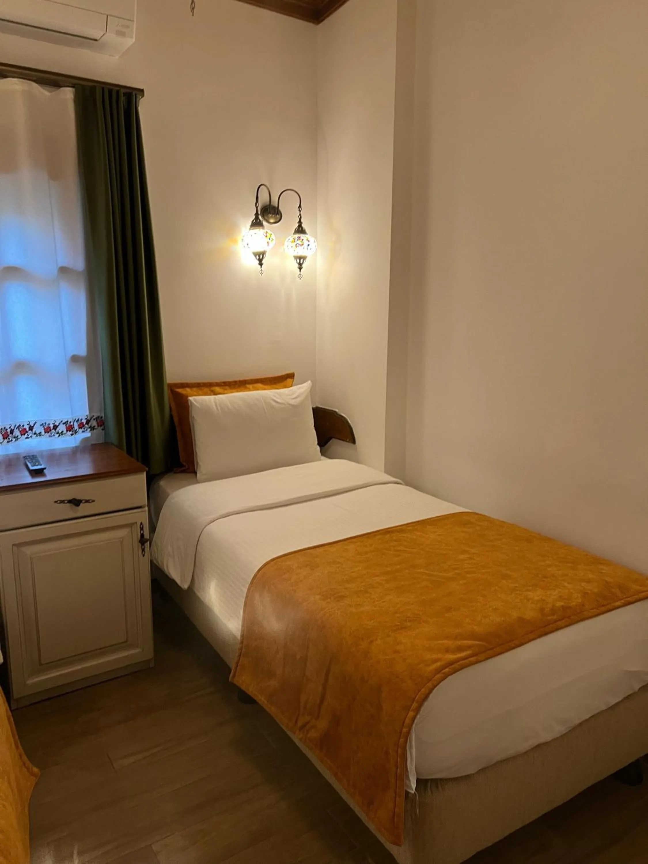 Bed in White Garden Hotel-Adult Only