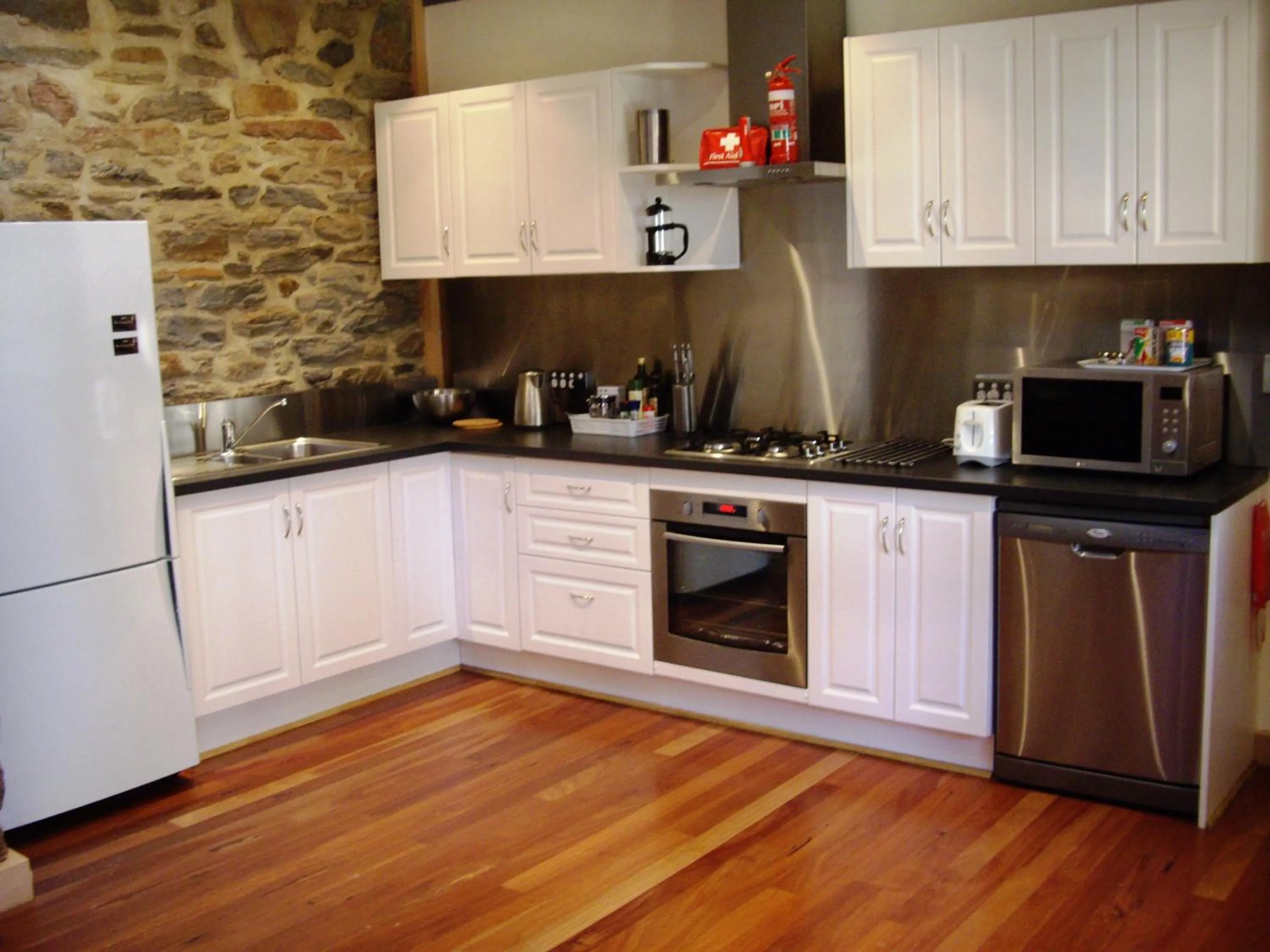 Kitchen or kitchenette in 1860 Wine Country Cottages