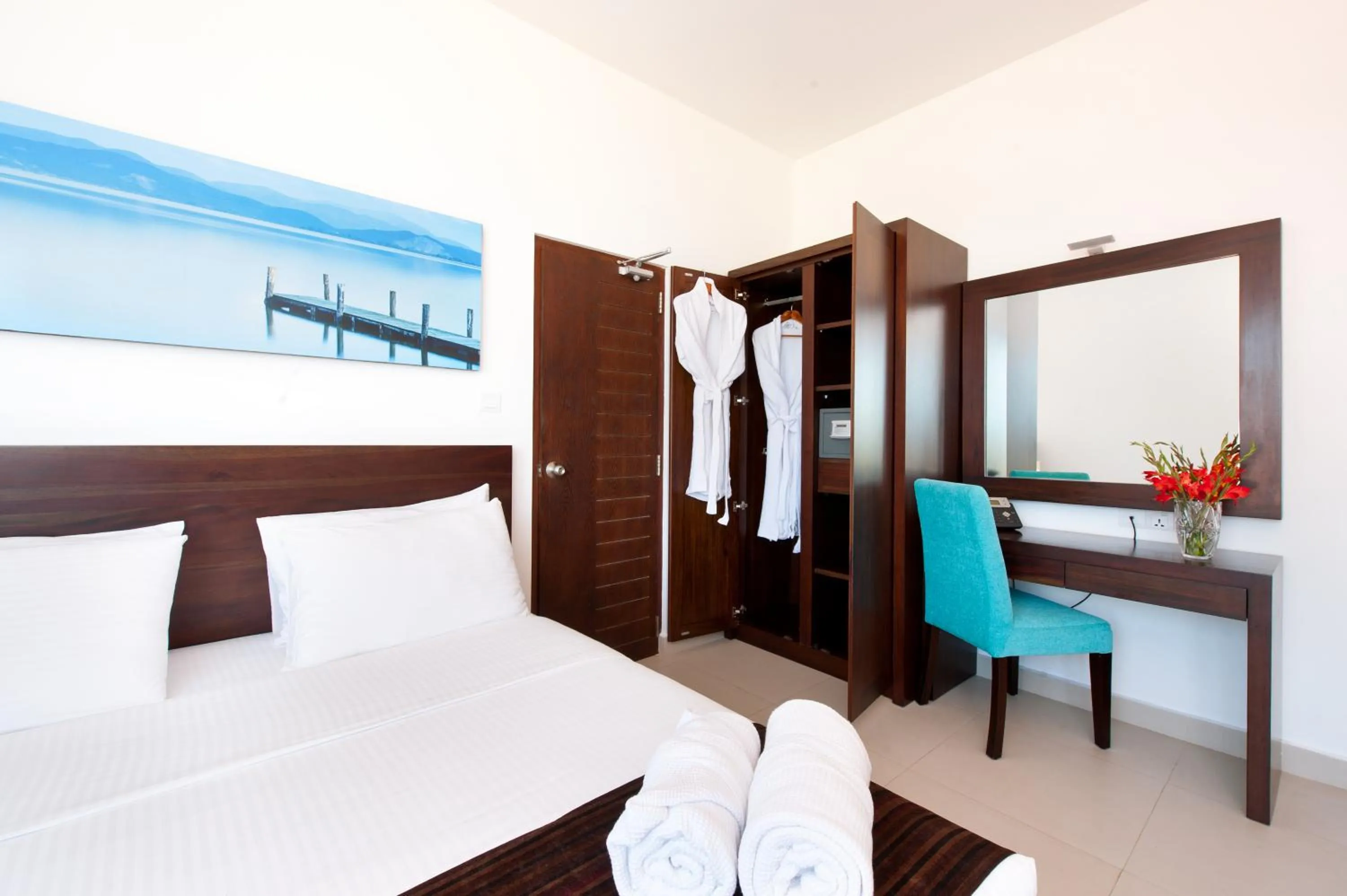 Bed in The Beach Apartments