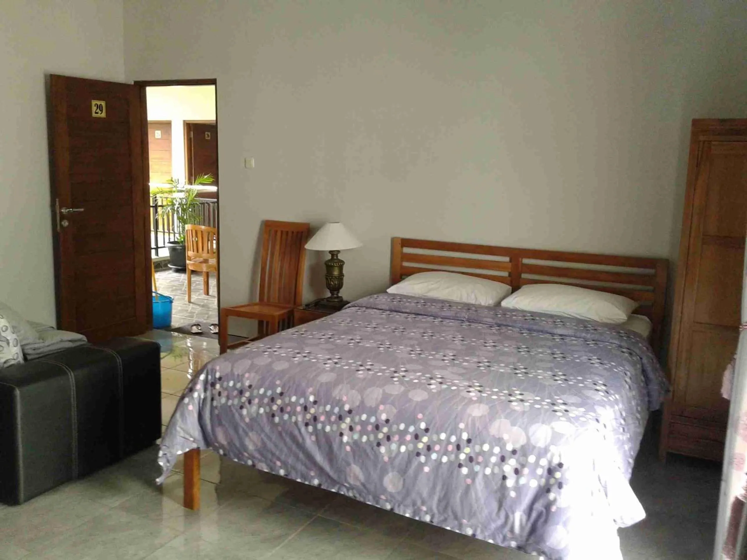 Photo of the whole room, Bed in Aloha Hotel Yogyakarta