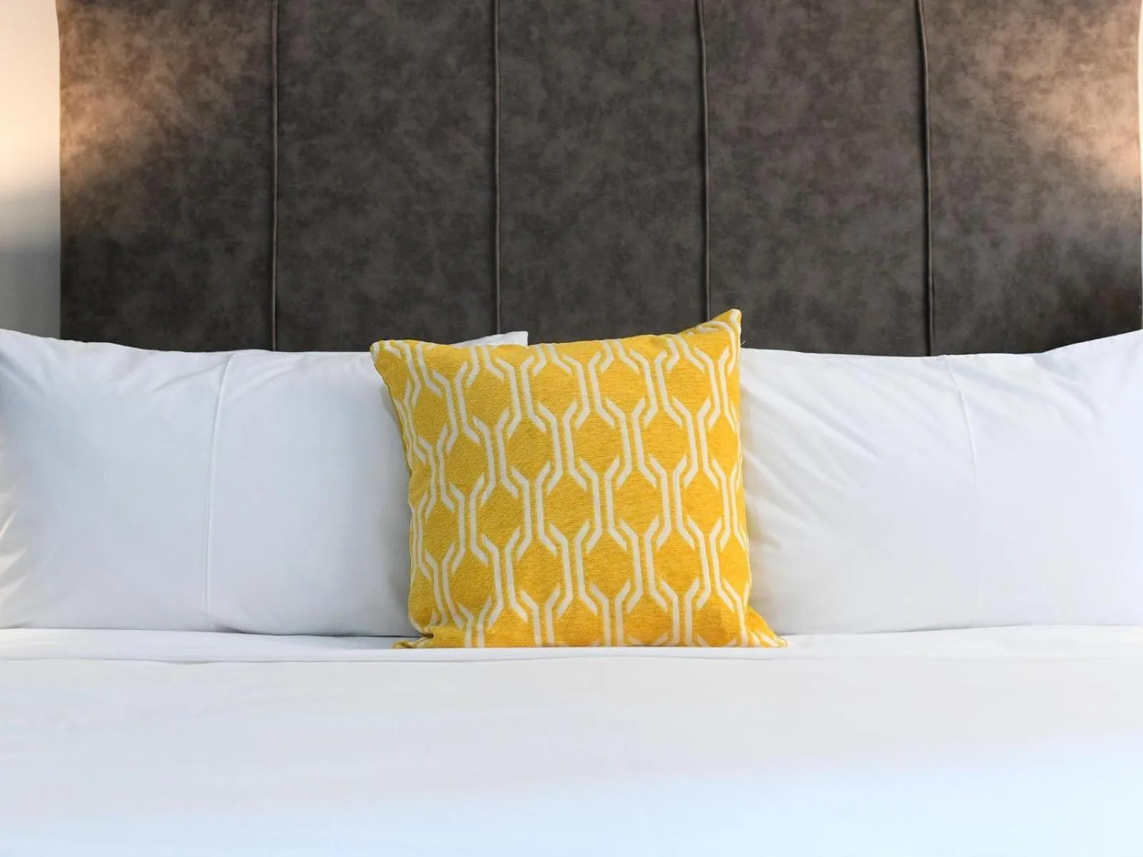 Bed in Next To Apartment Hotel