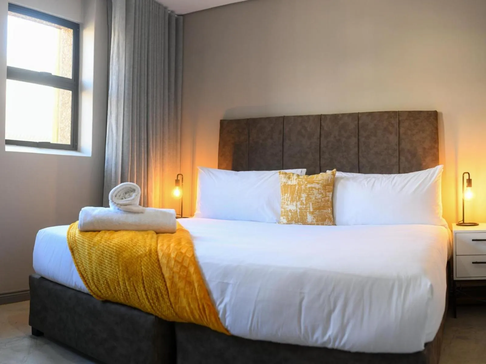 Bed in Next To Apartment Hotel