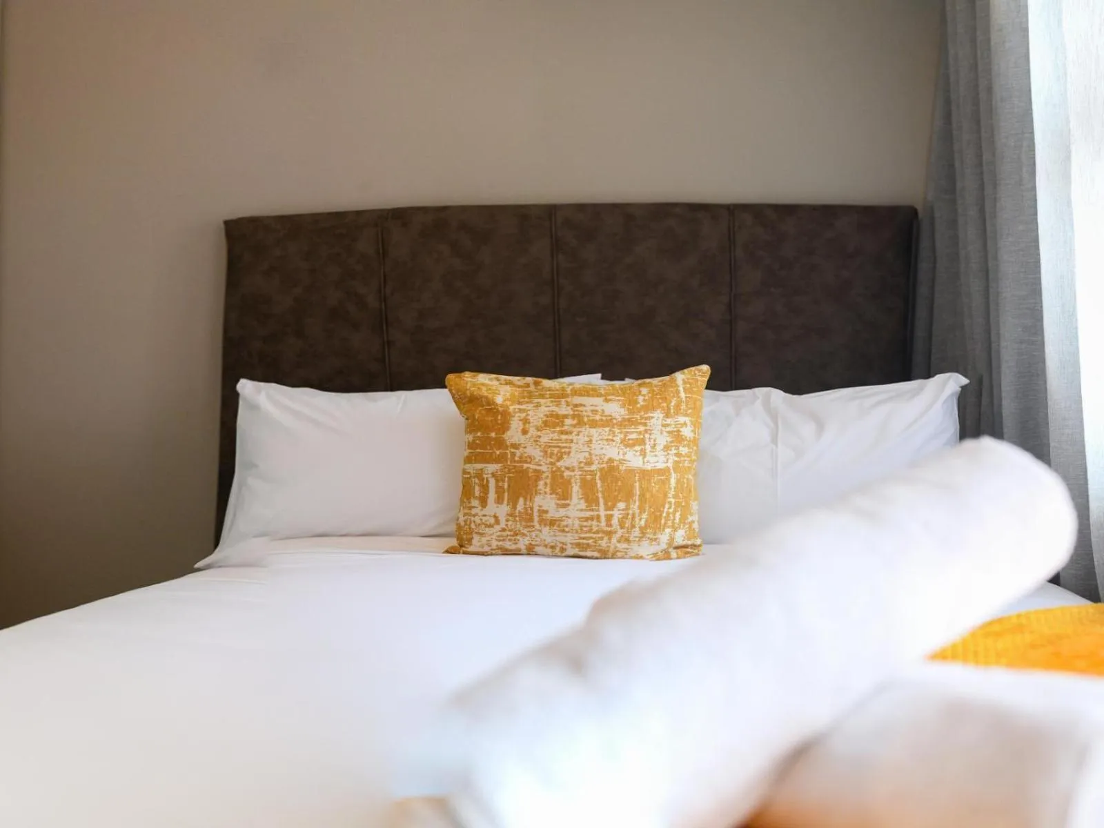 Bed in Next To Apartment Hotel