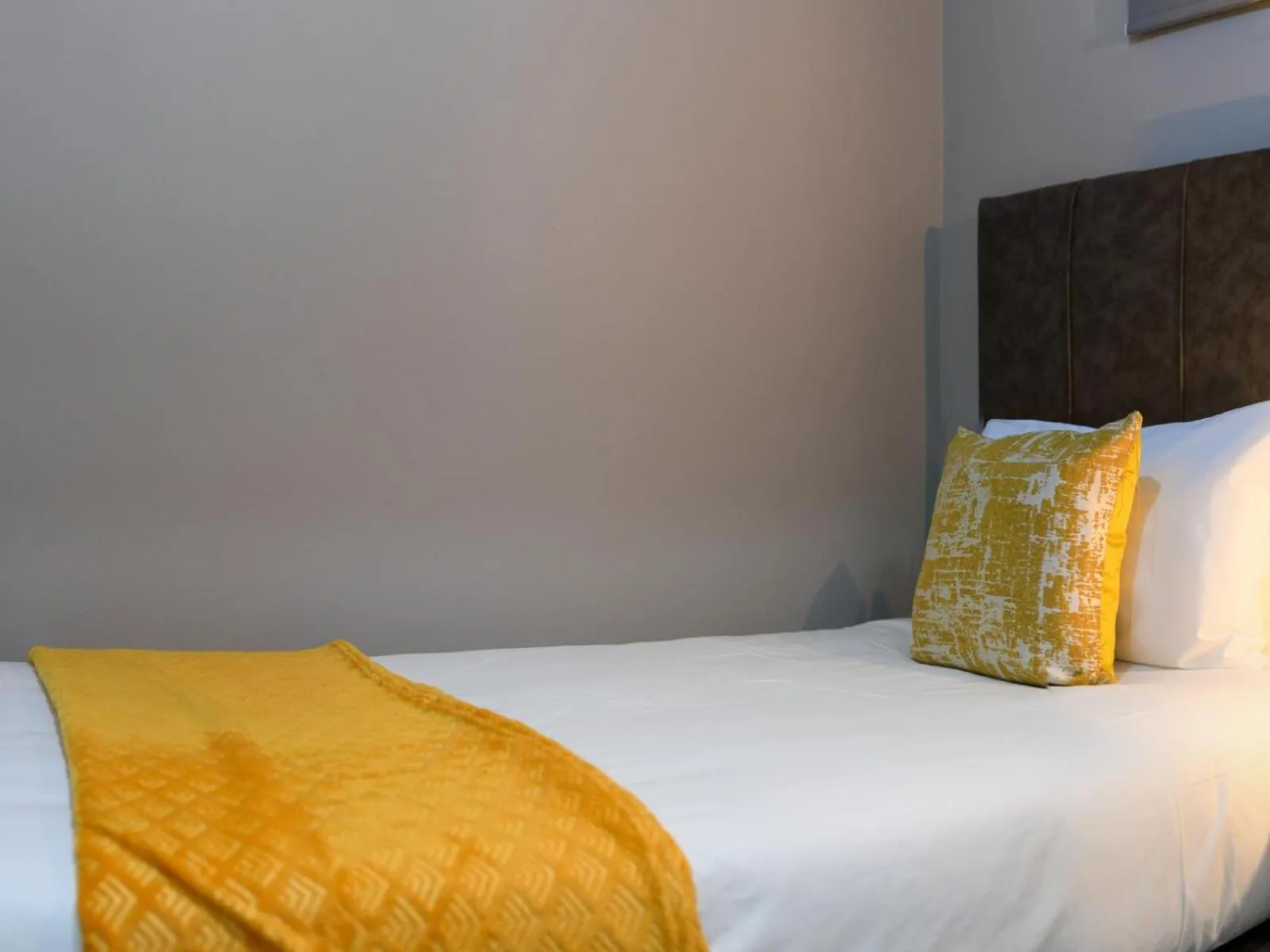 Bed in Next To Apartment Hotel