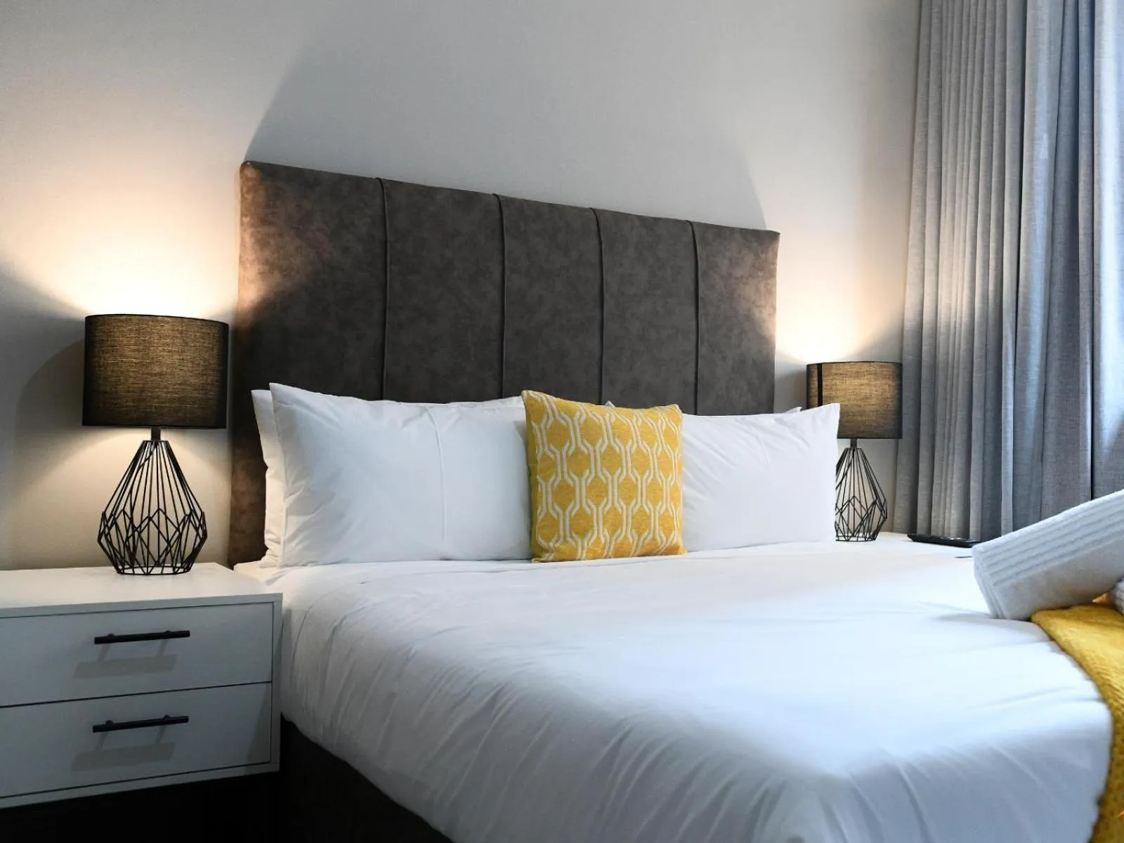 Bed in Next To Apartment Hotel