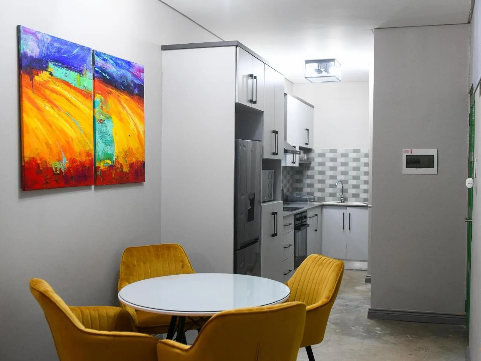 Kitchen or kitchenette in Next To Apartment Hotel