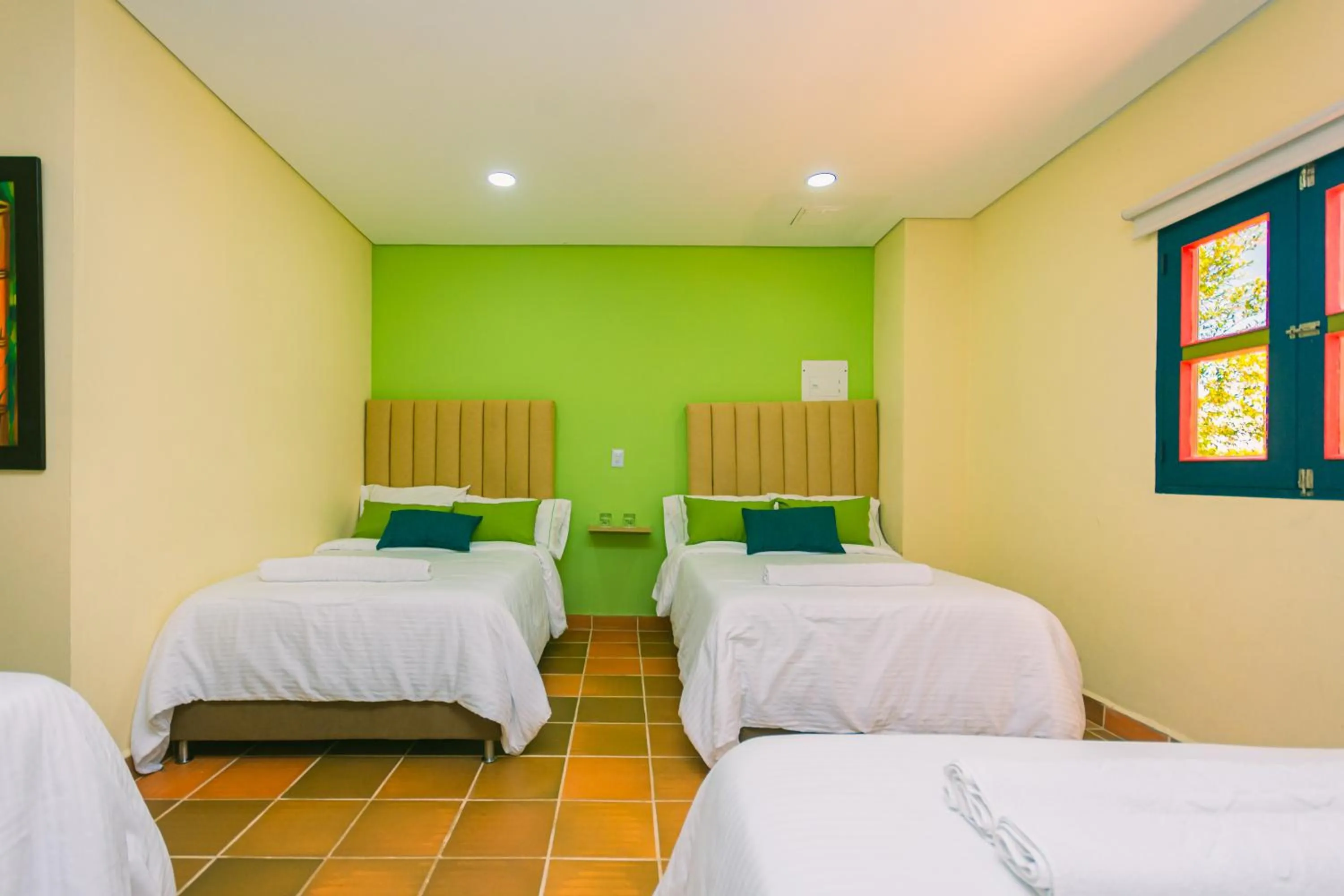Bed in Hotel Bambu Guatape