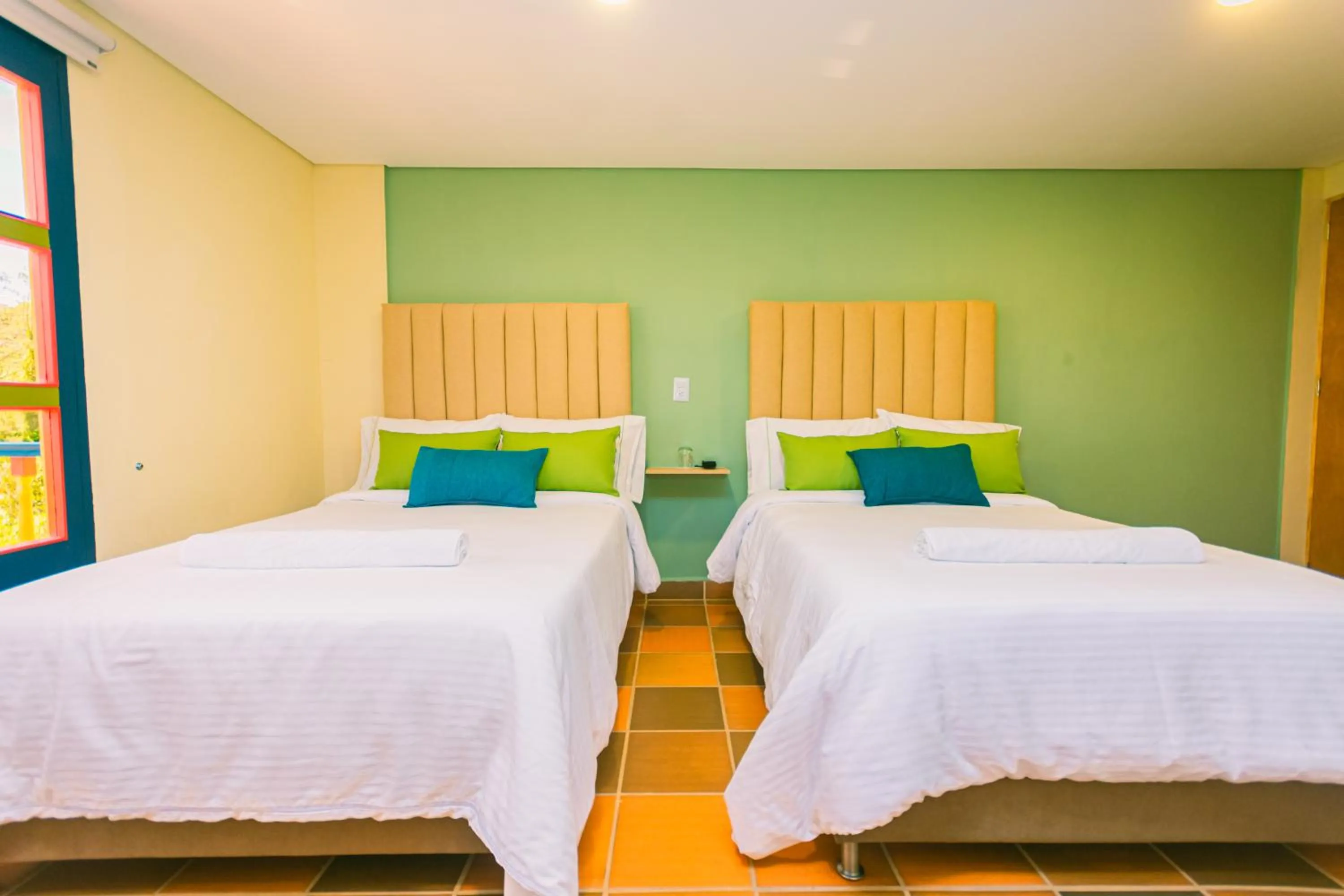 Bed in Hotel Bambu Guatape