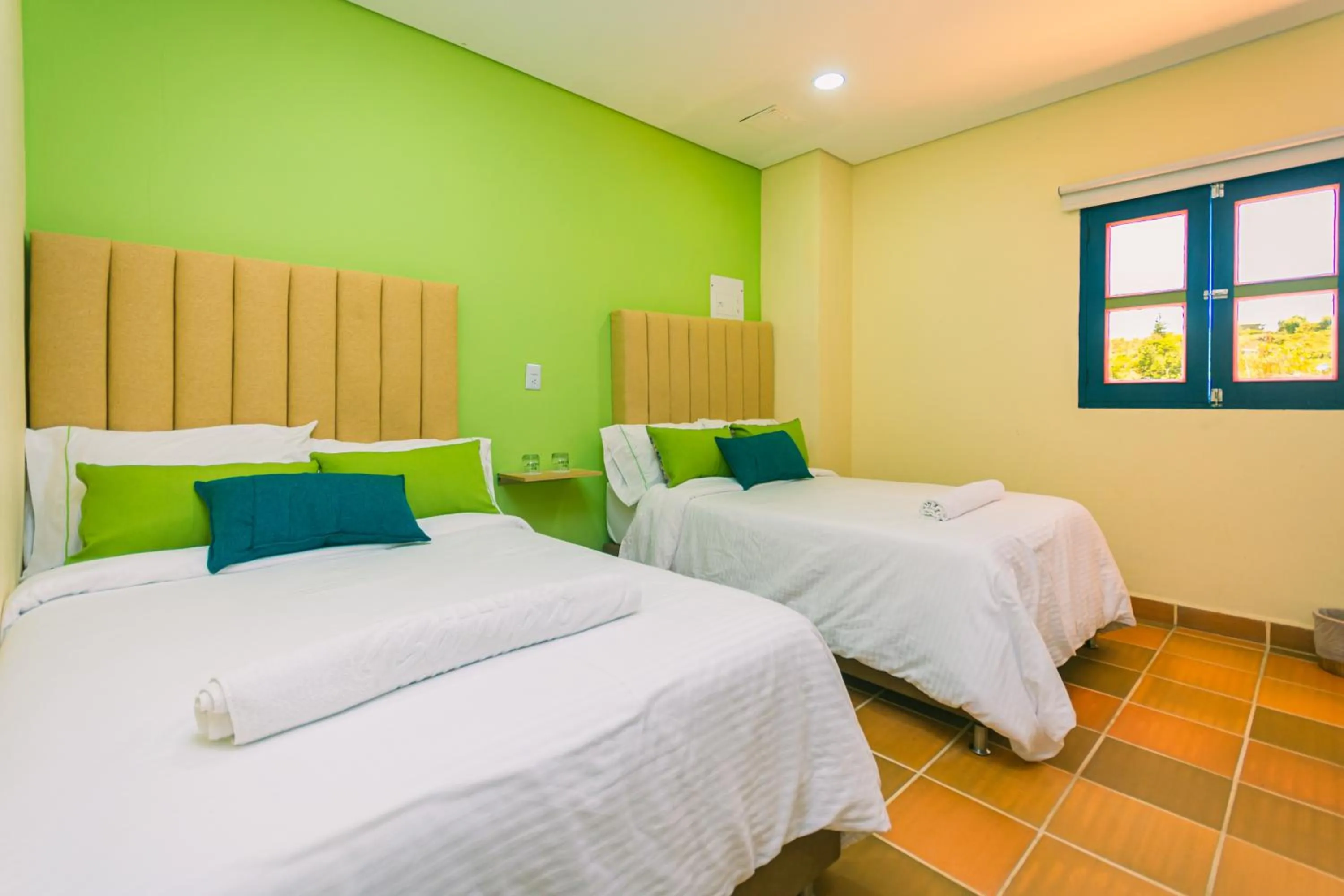 Bed in Hotel Bambu Guatape