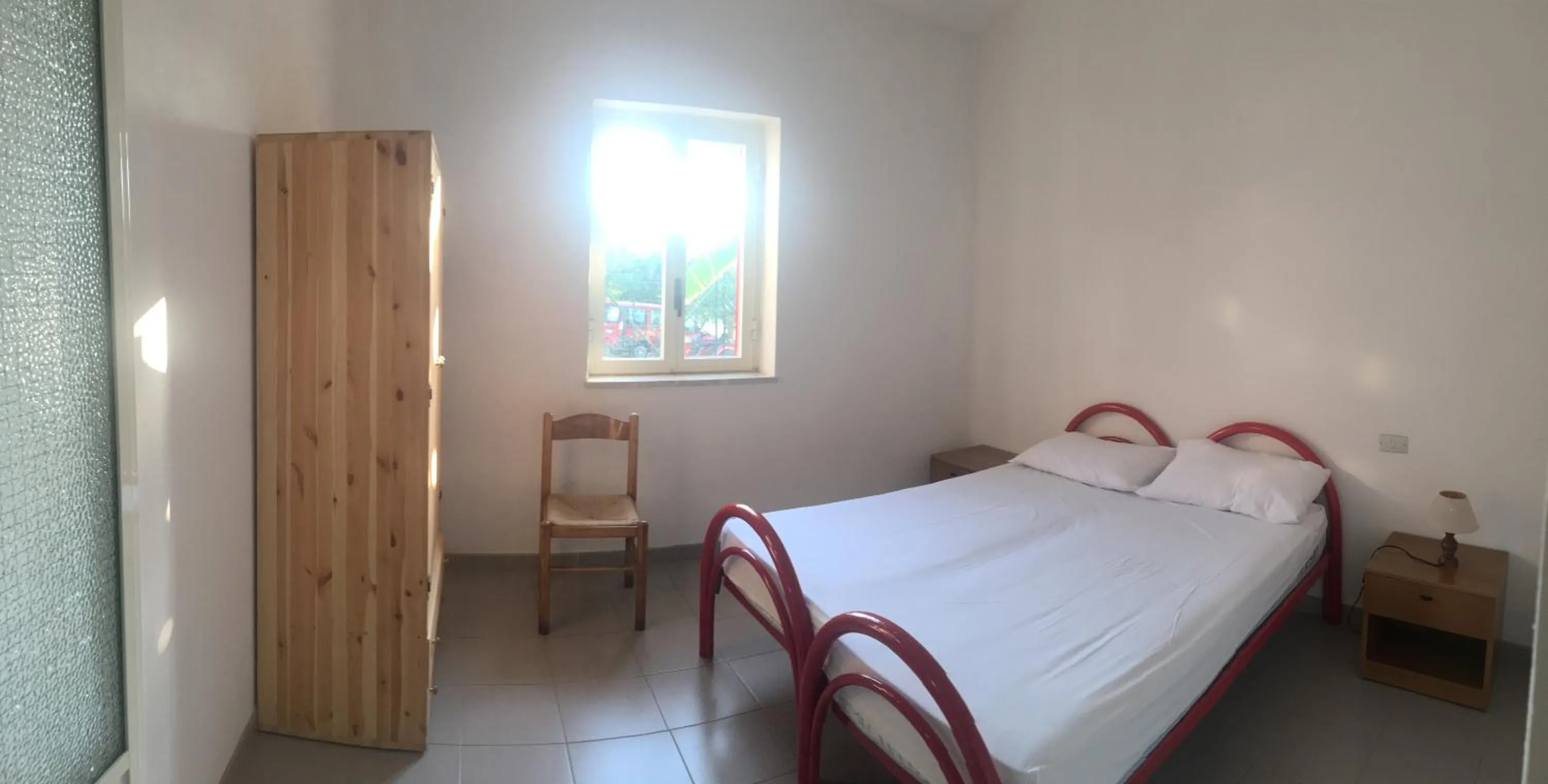 Bed in Villaggio Camping La Scogliera