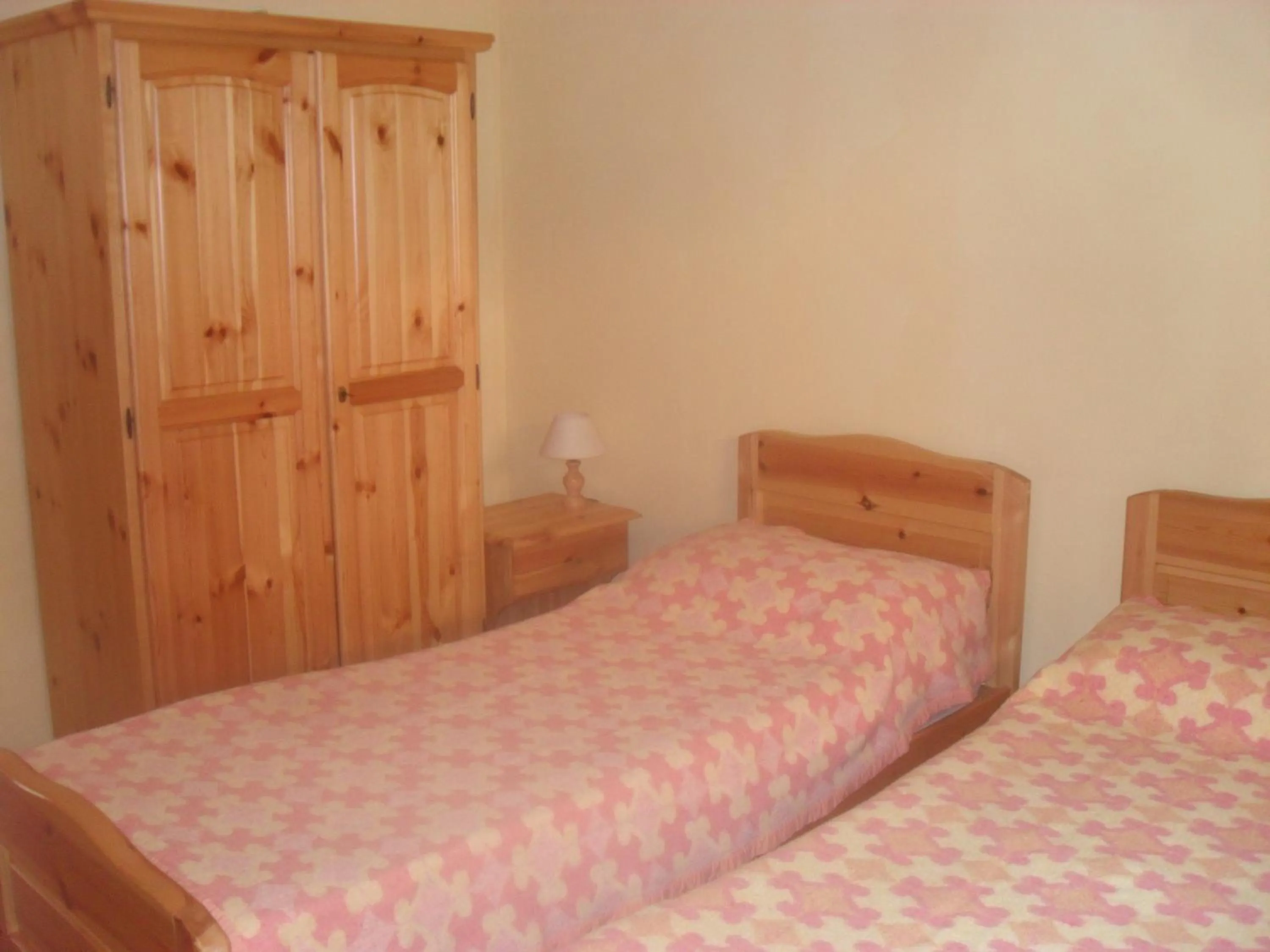 Bed in Villaggio Camping La Scogliera