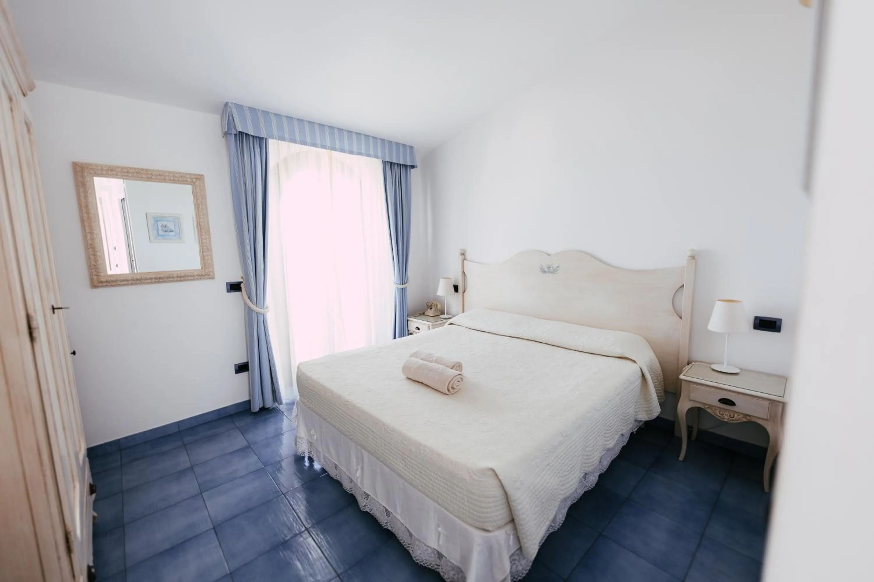 Bed in Baia Delphis Resort