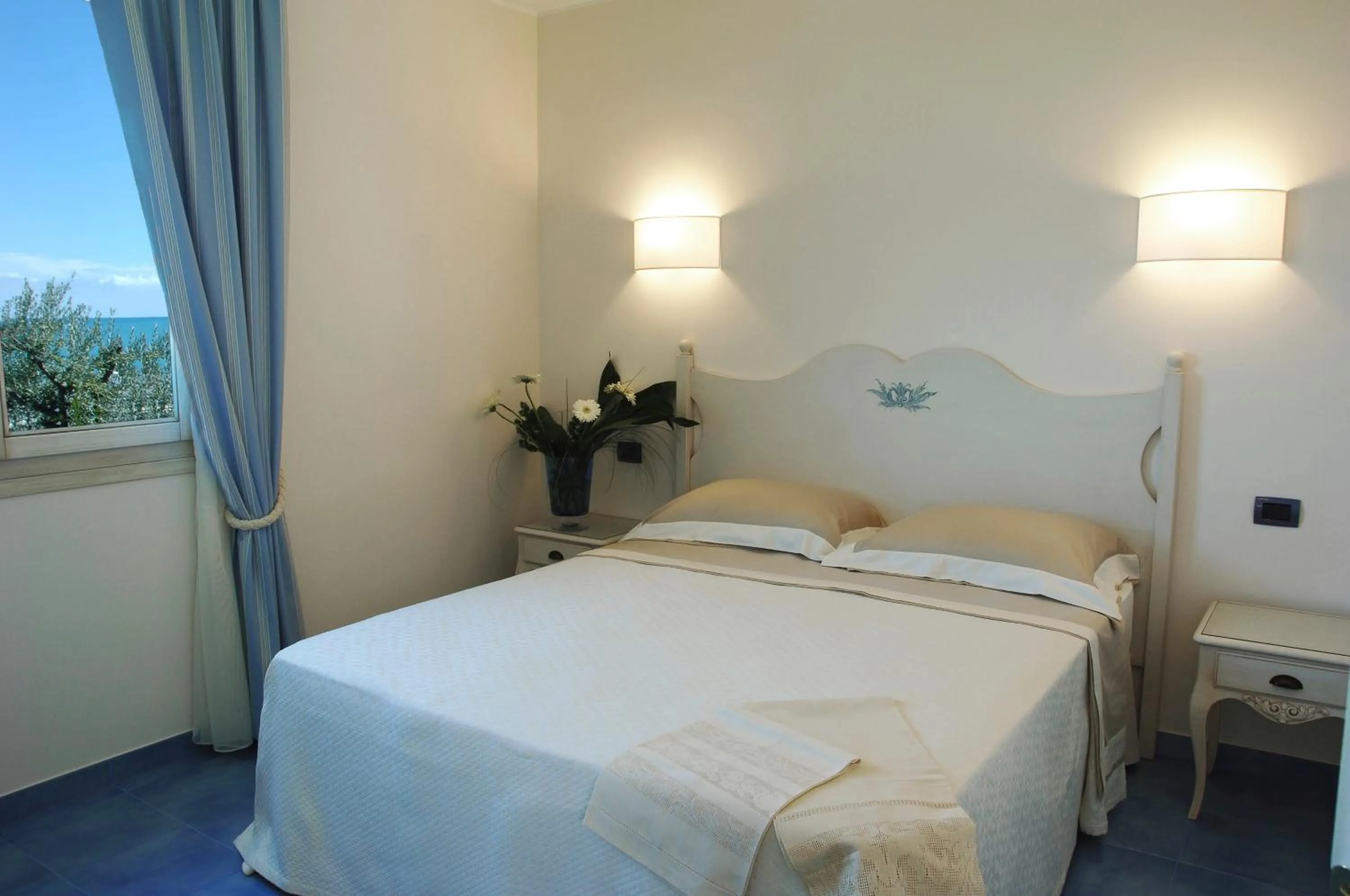 Bed in Baia Delphis Resort