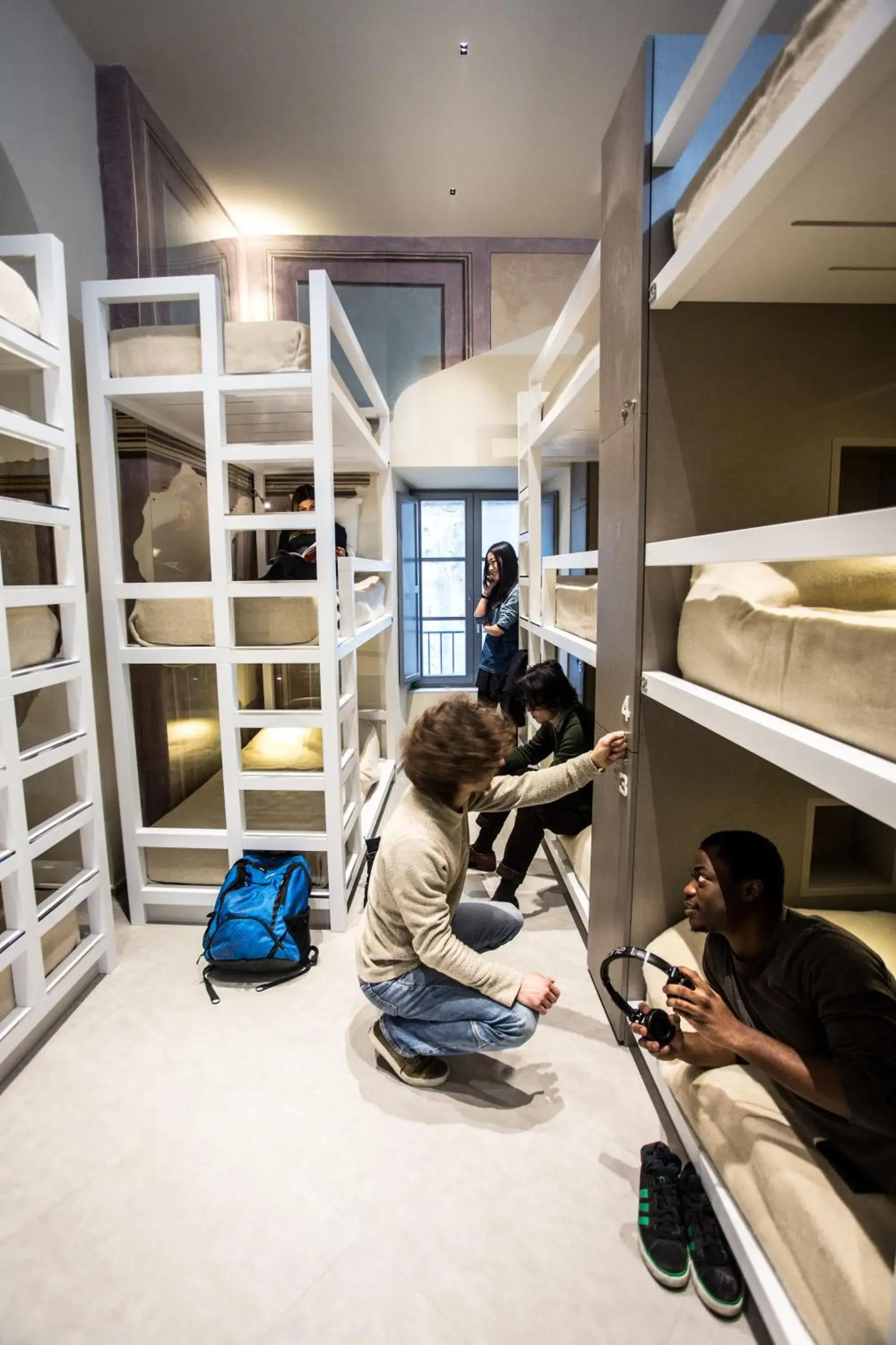 Bed in 12-Bed Mixed Dormitory Room in Little Italy Hostel Ex Chiesa S Donato Bed in 12-Bed Mixed Dormitory Room in Little Italy Hostel Ex Chiesa S Donato