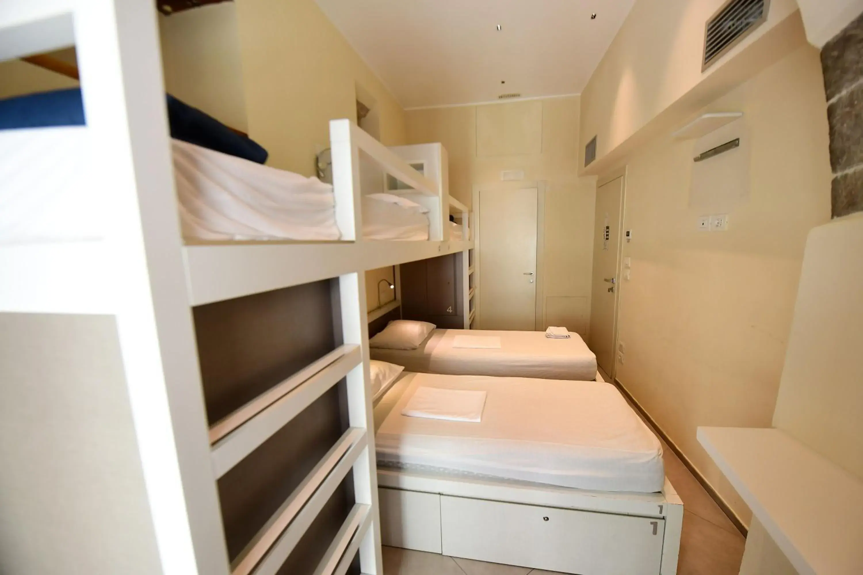 Bed in 4-Bed Mixed Dormitory Room in Little Italy Hostel Ex Chiesa S Donato Bed in 4-Bed Mixed Dormitory Room in Little Italy Hostel Ex Chiesa S Donato