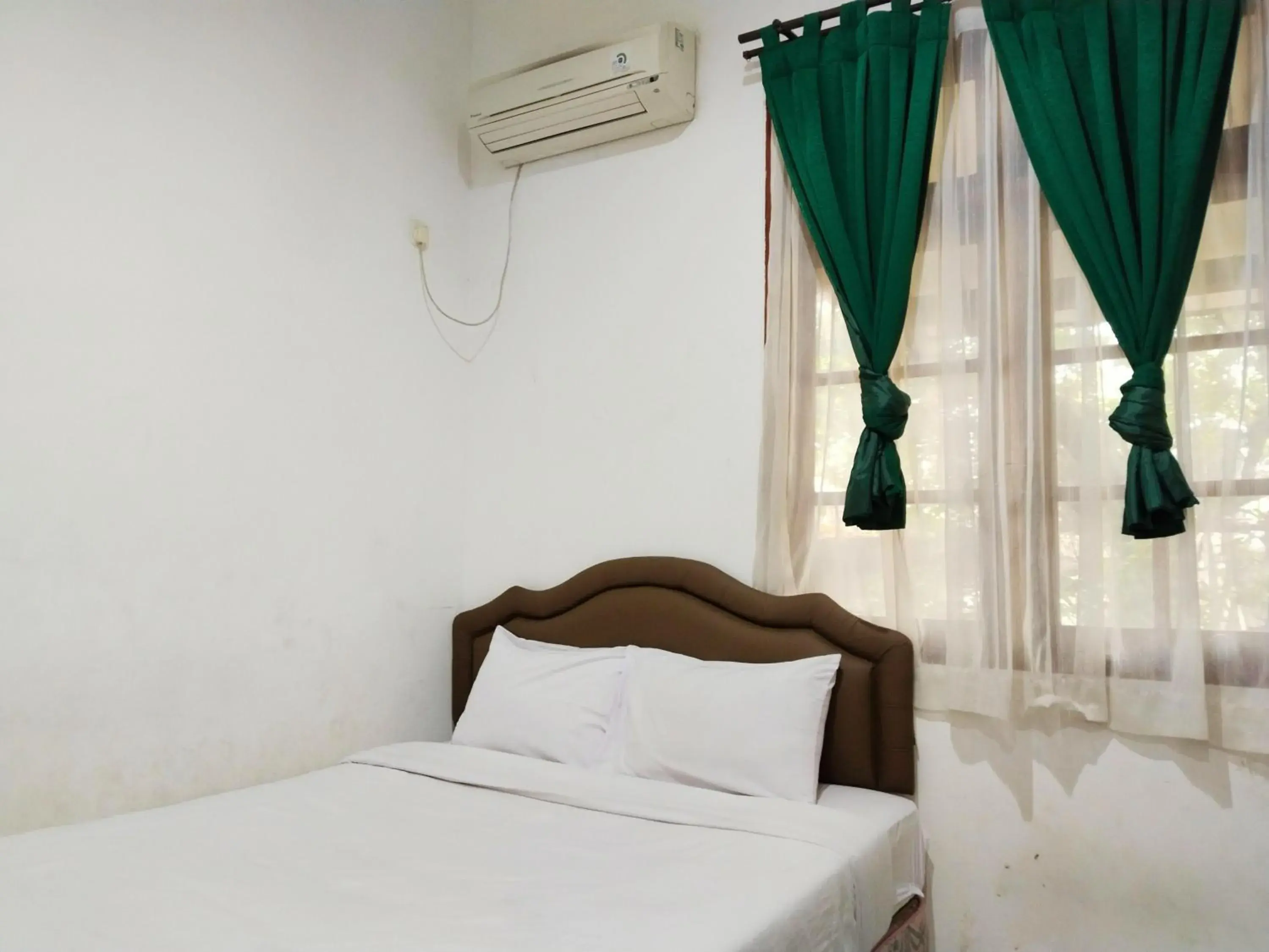 Bed in DeKuningan House Bed in DeKuningan House