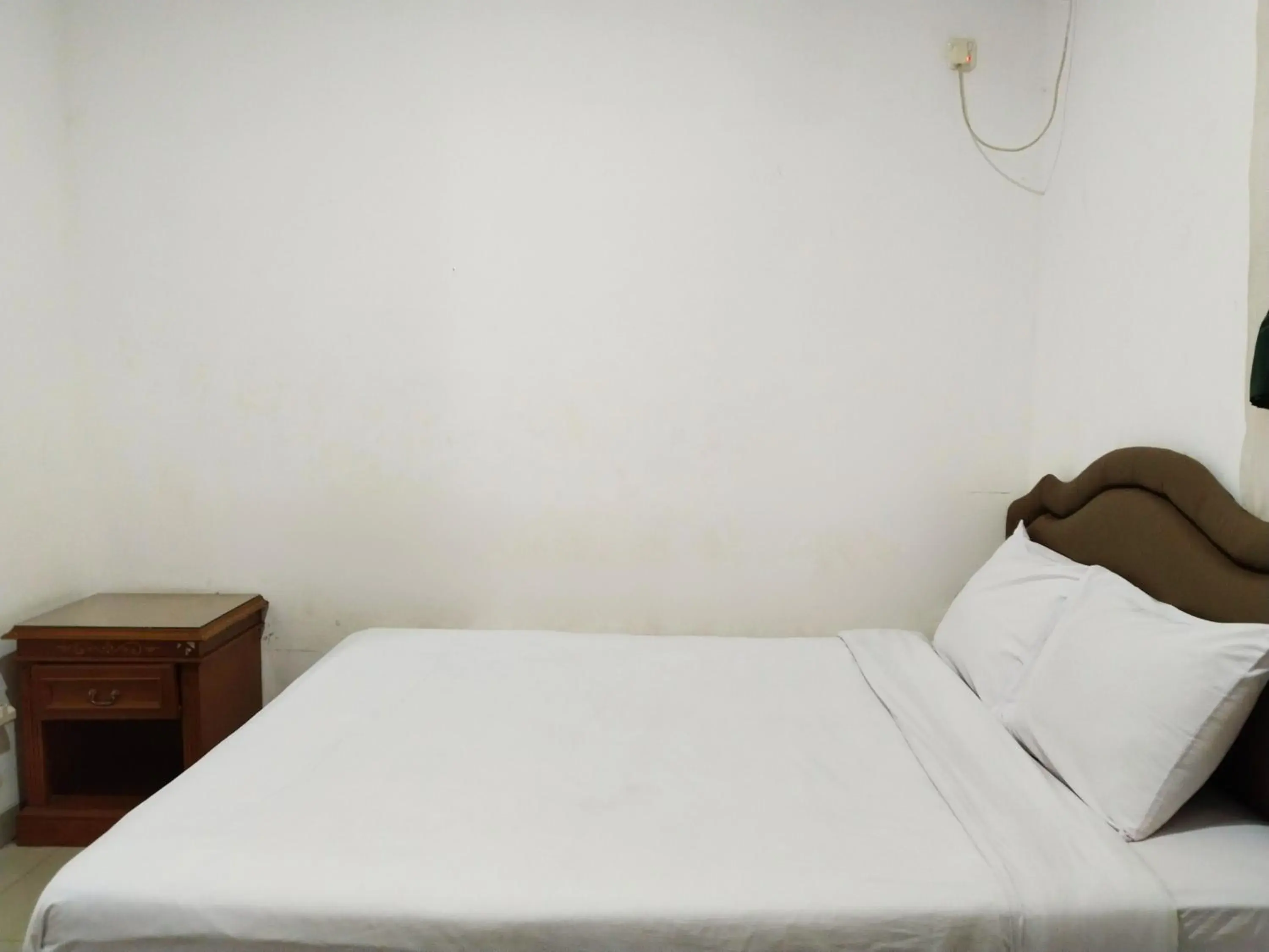 Bed in DeKuningan House Bed in DeKuningan House