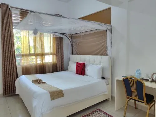 Bed in Garden Courts Hotel Masaka
