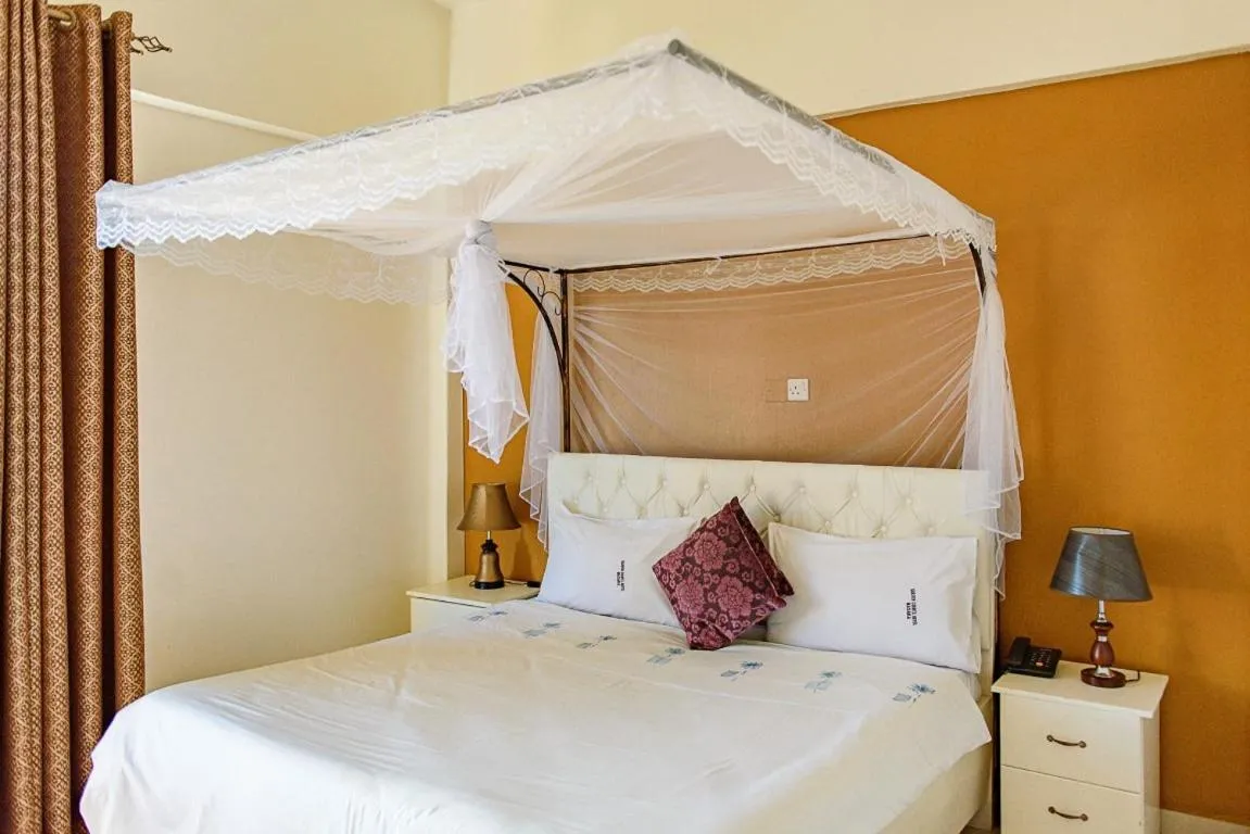 Bed in Garden Courts Hotel Masaka