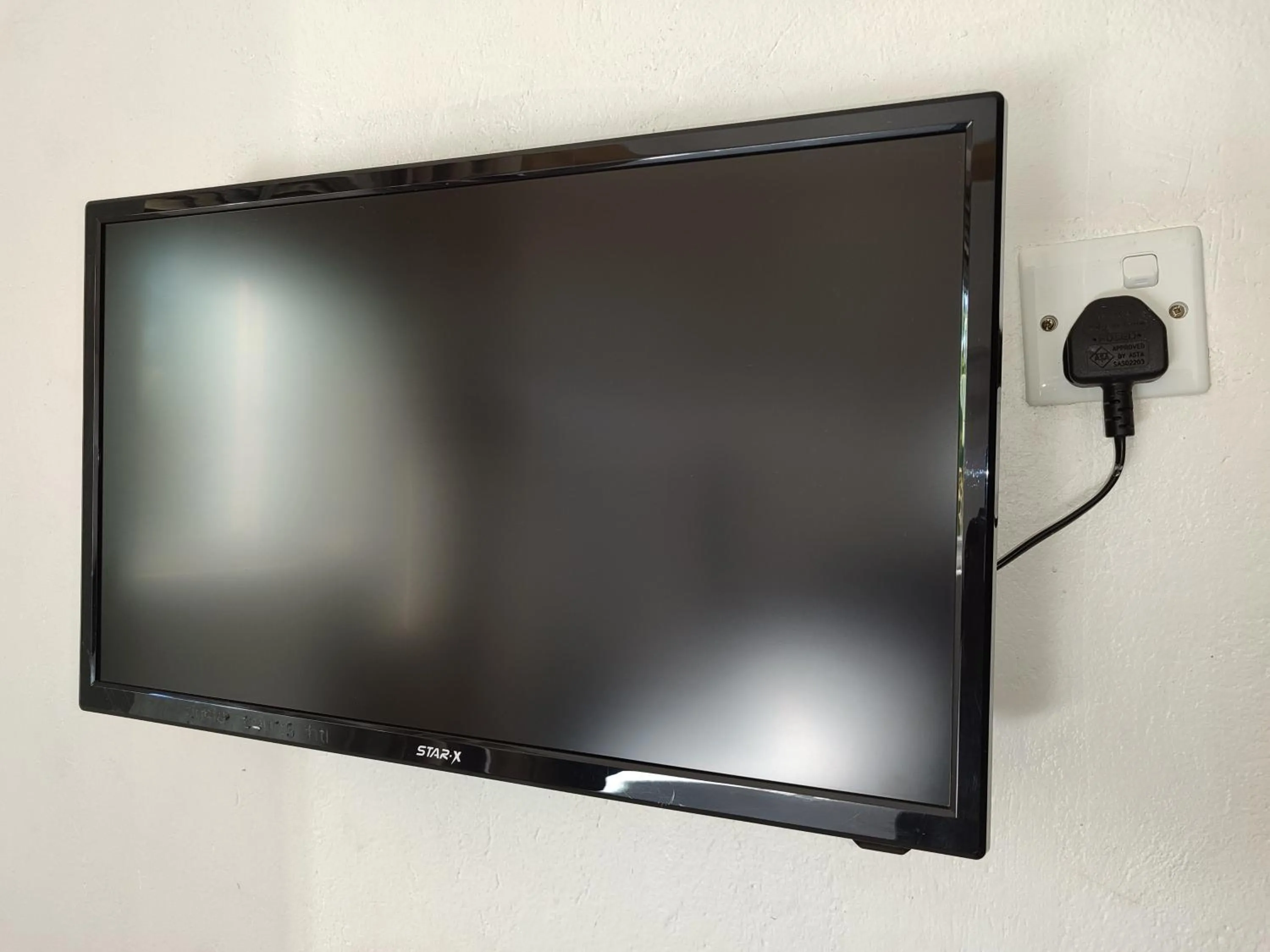 TV and multimedia in Garden Courts Hotel Masaka