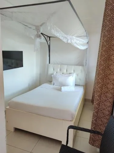 Bed in Garden Courts Hotel Masaka