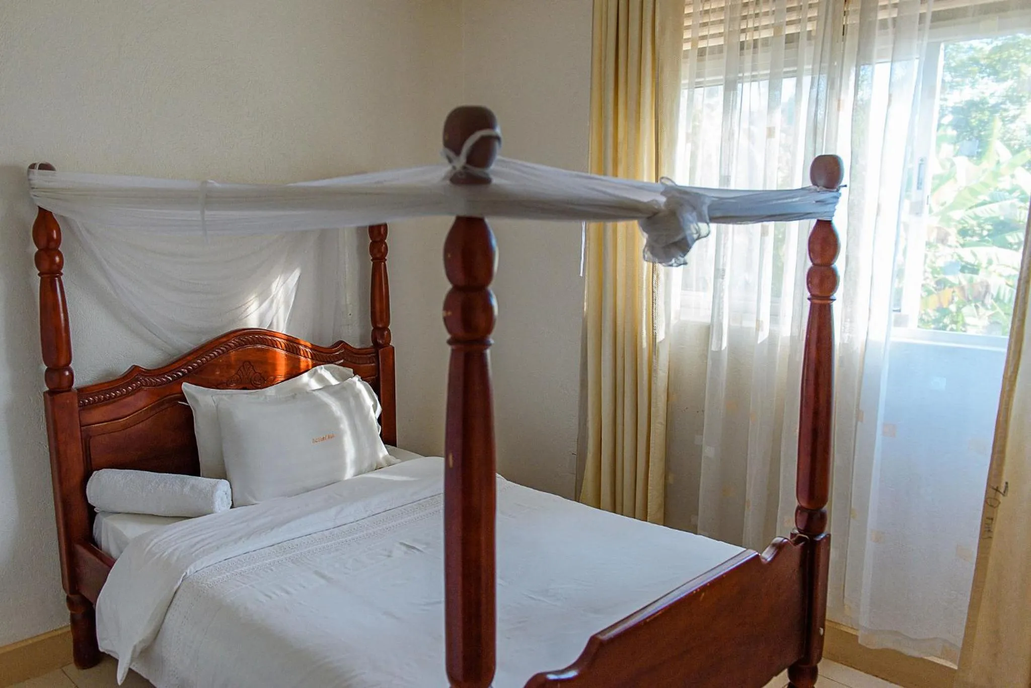 Bed in Garden Courts Hotel Masaka
