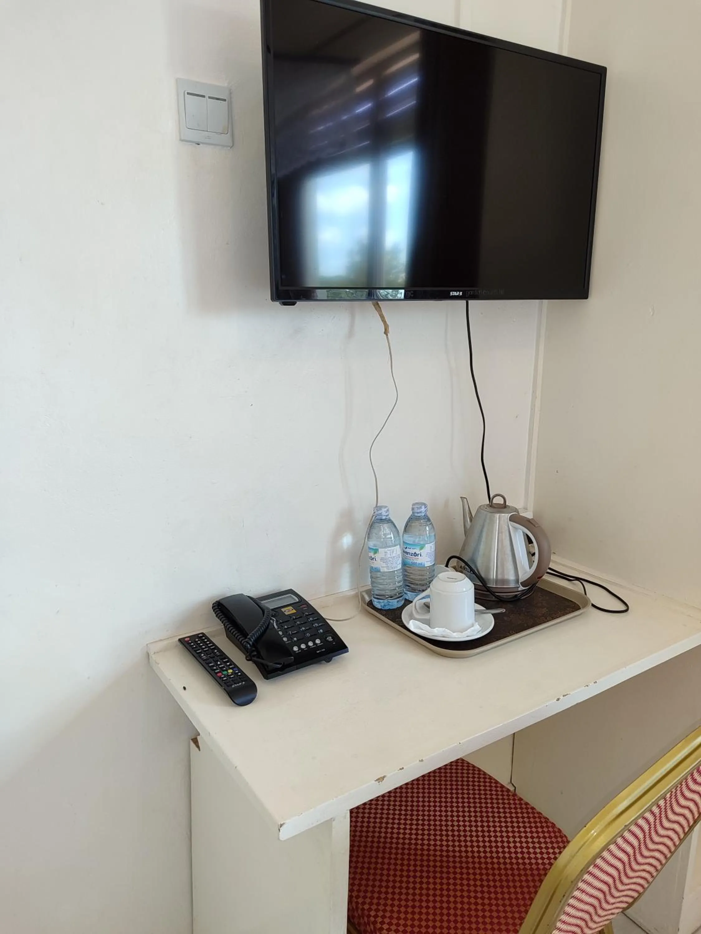 TV and multimedia in Garden Courts Hotel Masaka