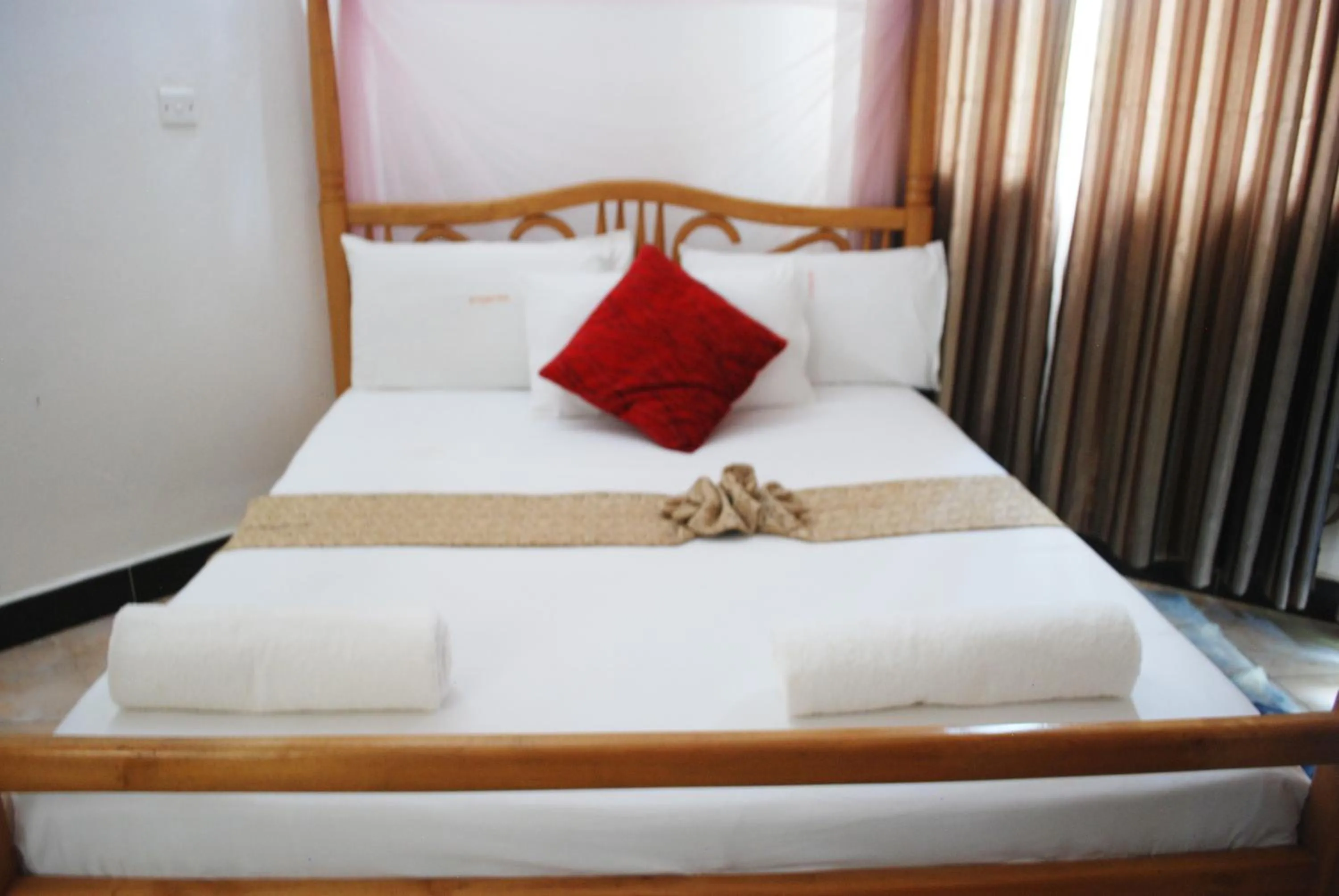 Bed in Garden Courts Hotel Masaka