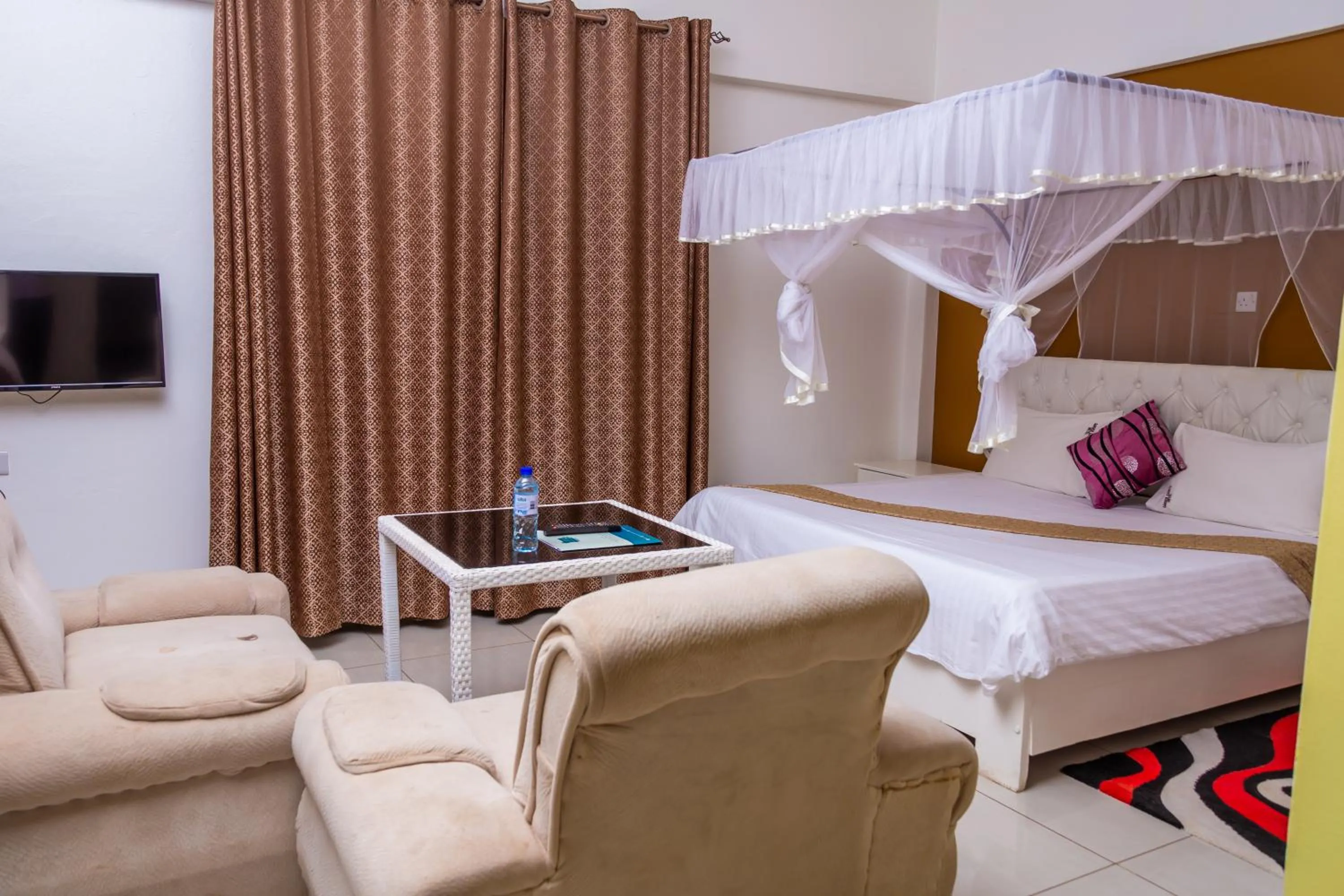 Photo of the whole room in Garden Courts Hotel Masaka