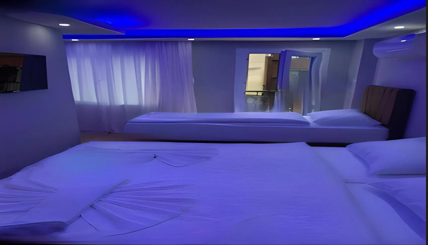 Bed in BLUE ROYAL HOTEL
