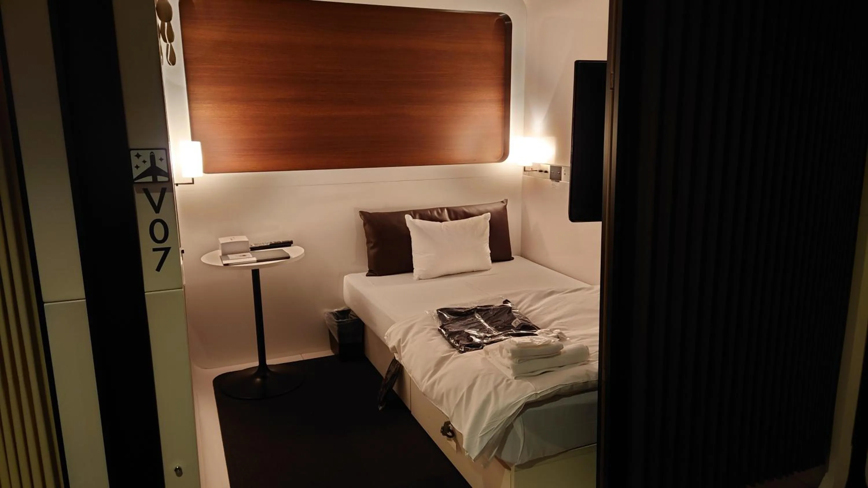 Photo of the whole room, Bed in First Cabin Haneda Terminal 1