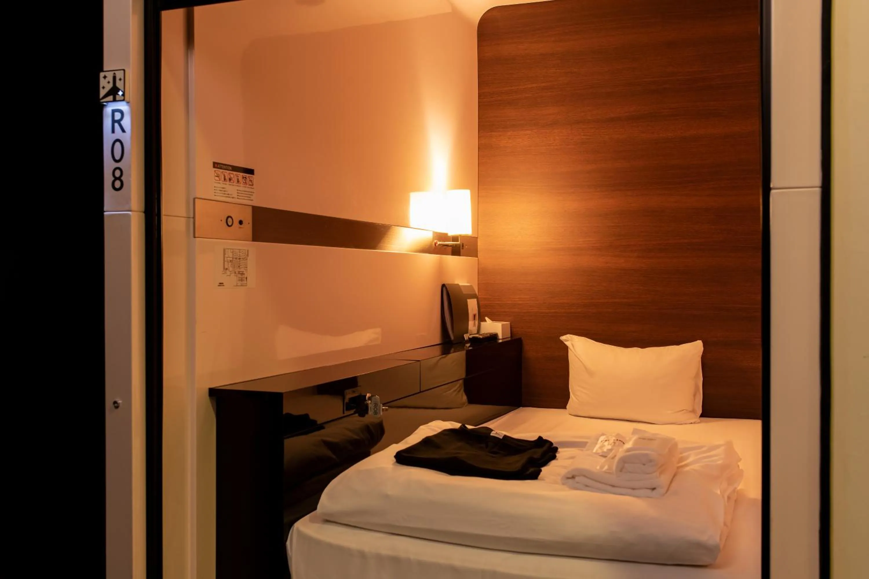 Photo of the whole room, Bed in First Cabin Haneda Terminal 1