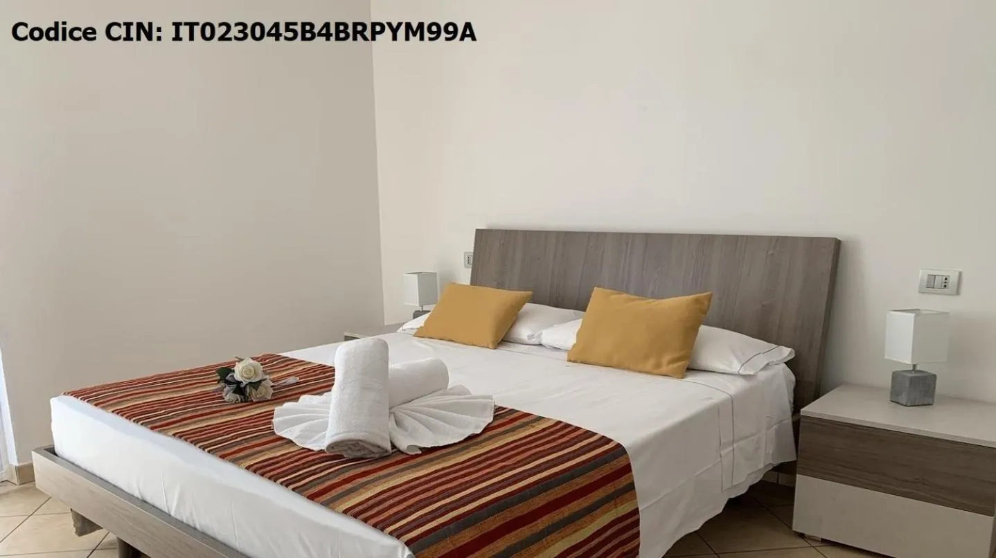 Bed in Hotel Dolomiti