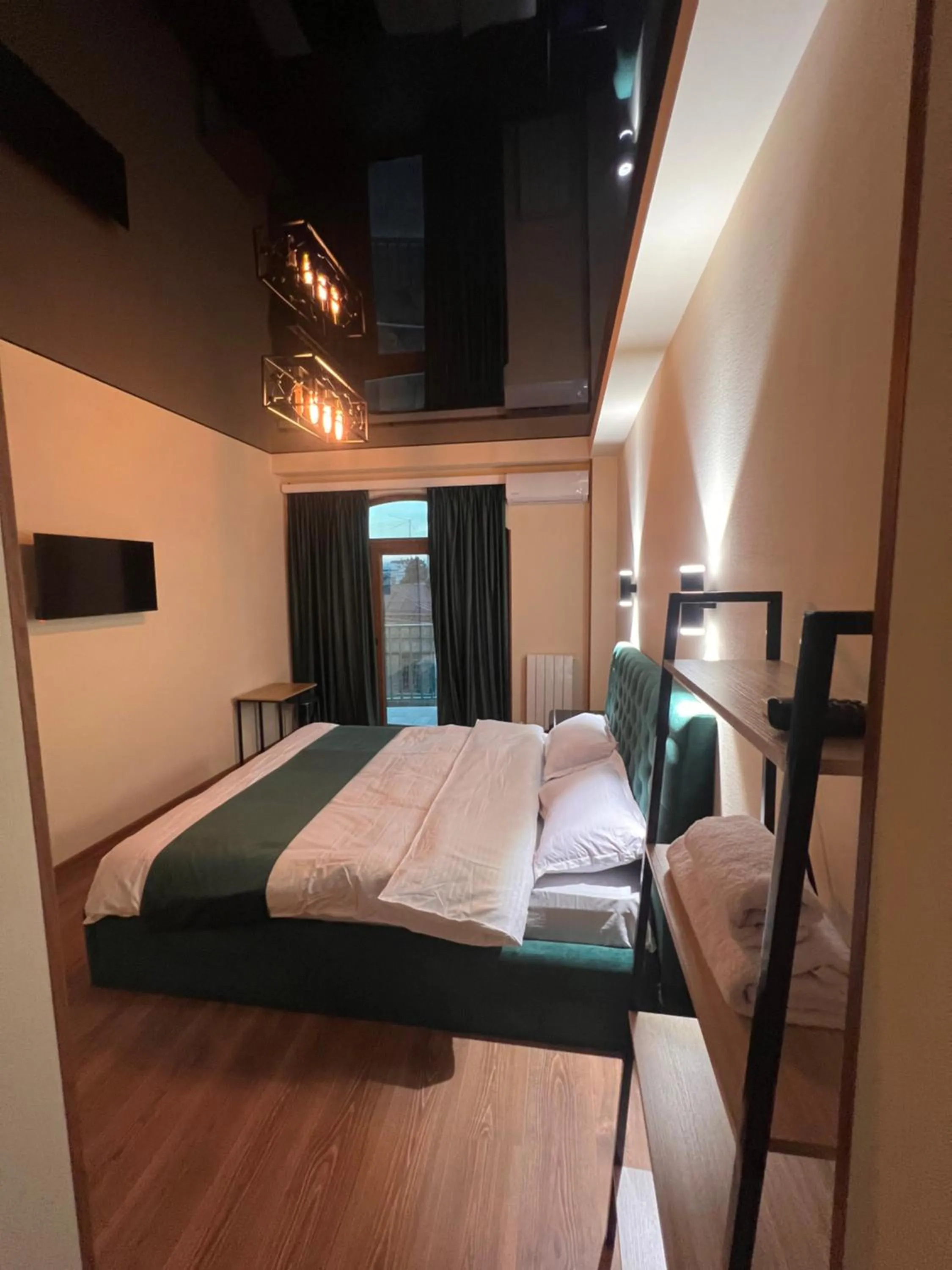 Bed in Natali Boutique Hotel