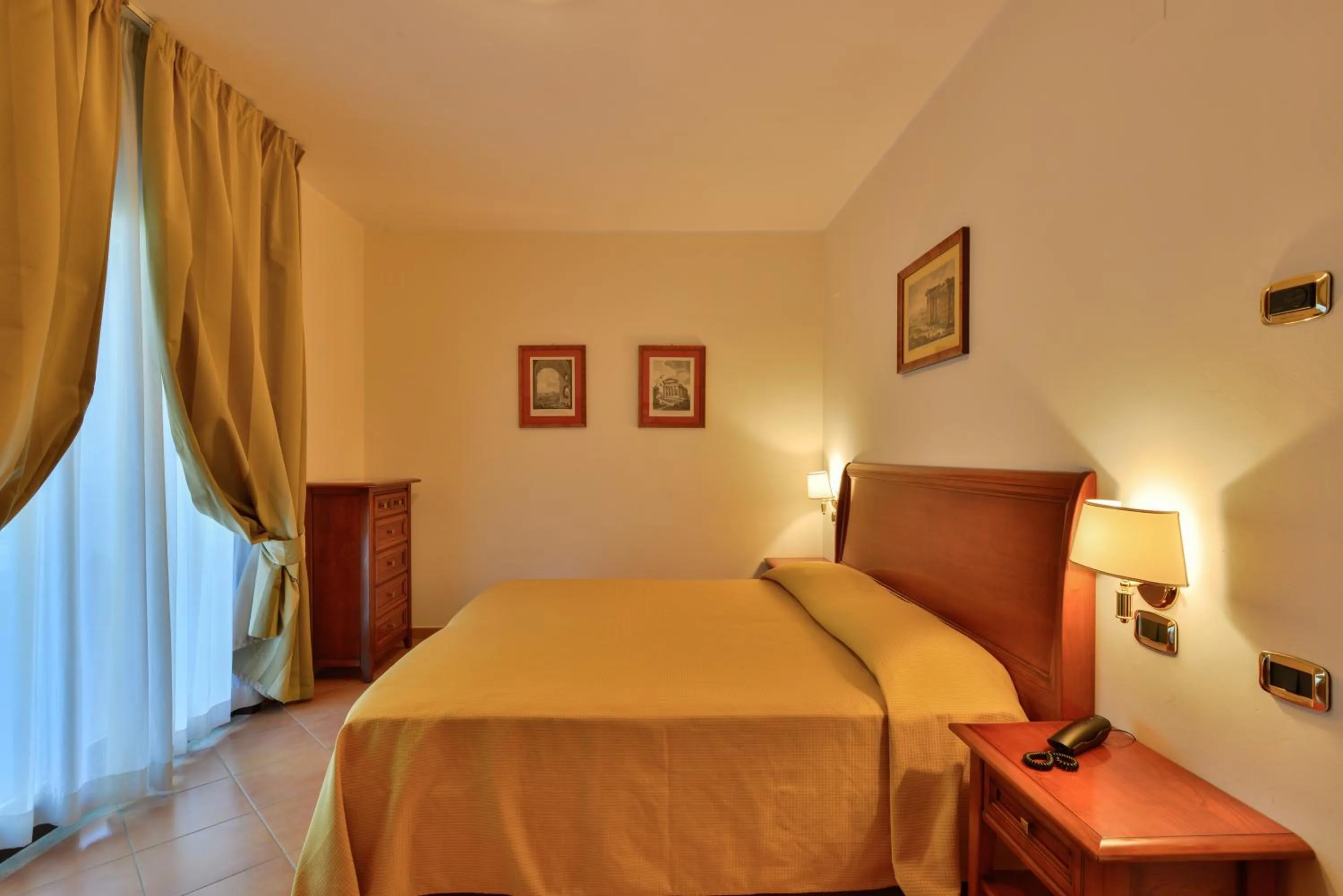 Bed in Minerva Resort Hotel