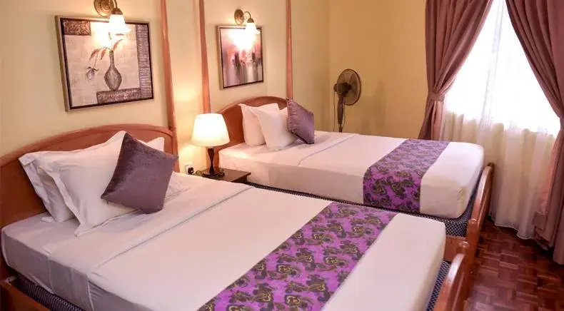 Bed in Residenz Apartments in Lotus Desaru Beach Resort Bed in Residenz Apartments in Lotus Desaru Beach Resort