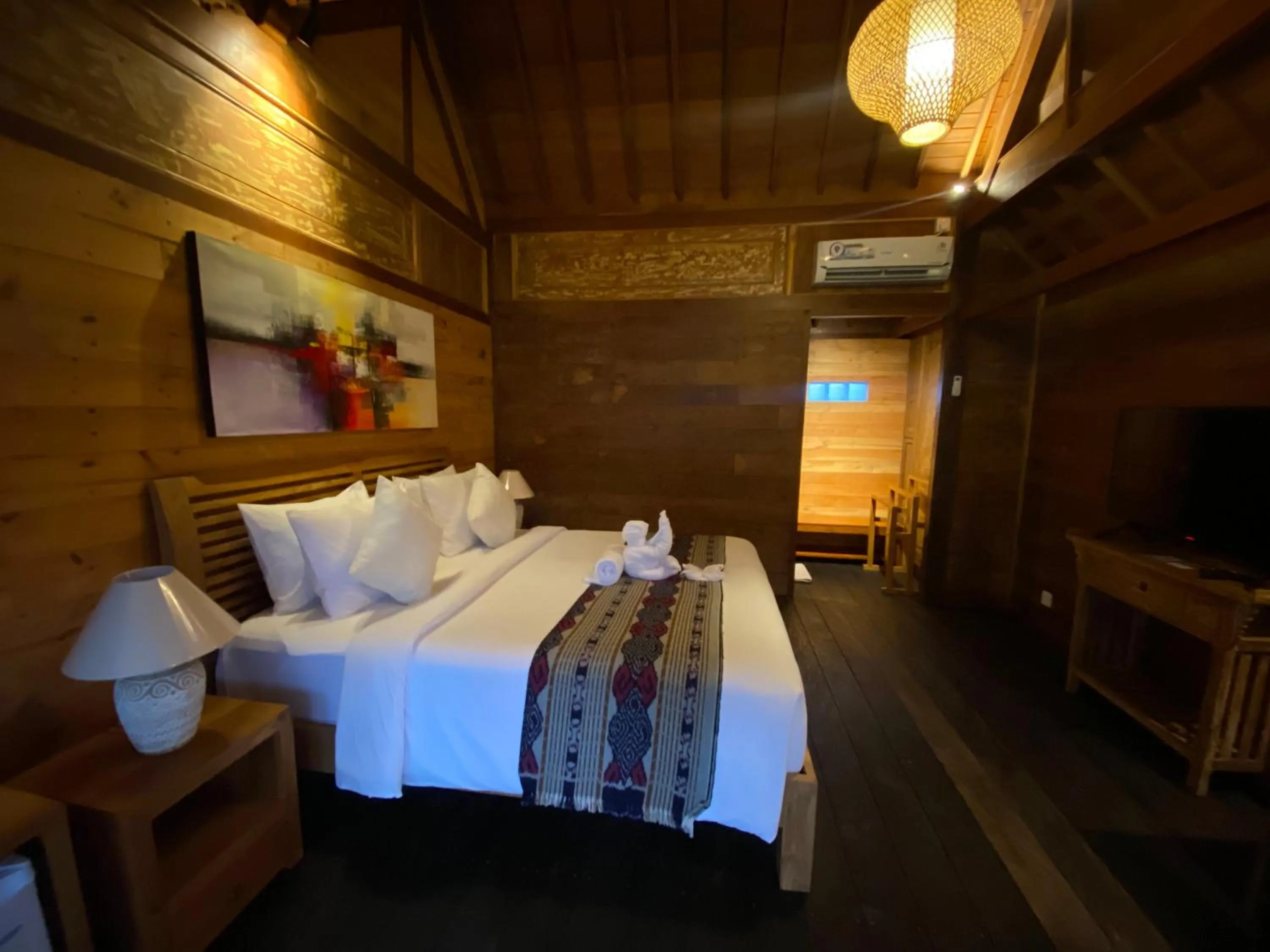 Bed in Kubu Sakian Villa and Restaurant Sidemen