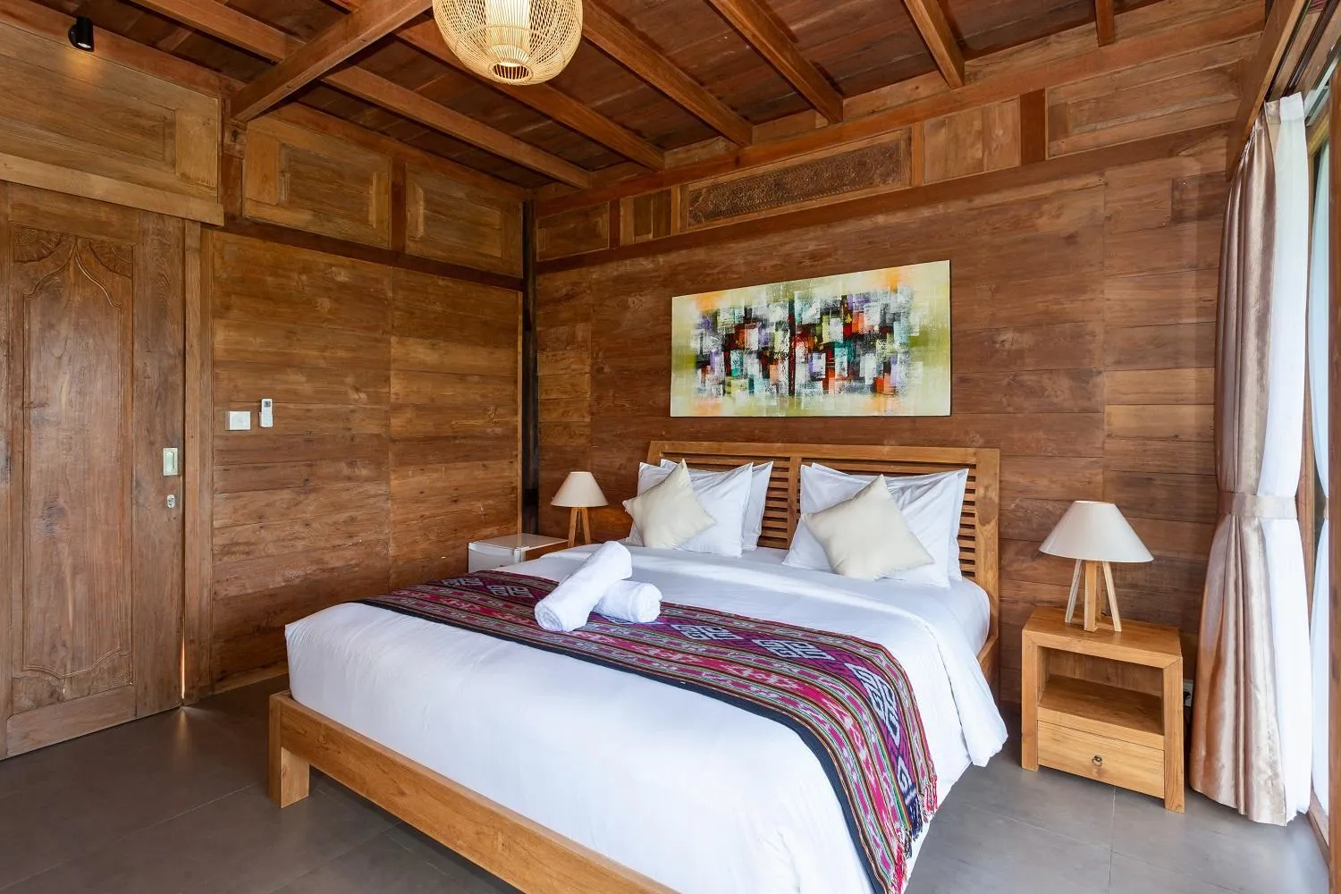 Bed in Kubu Sakian Villa and Restaurant Sidemen