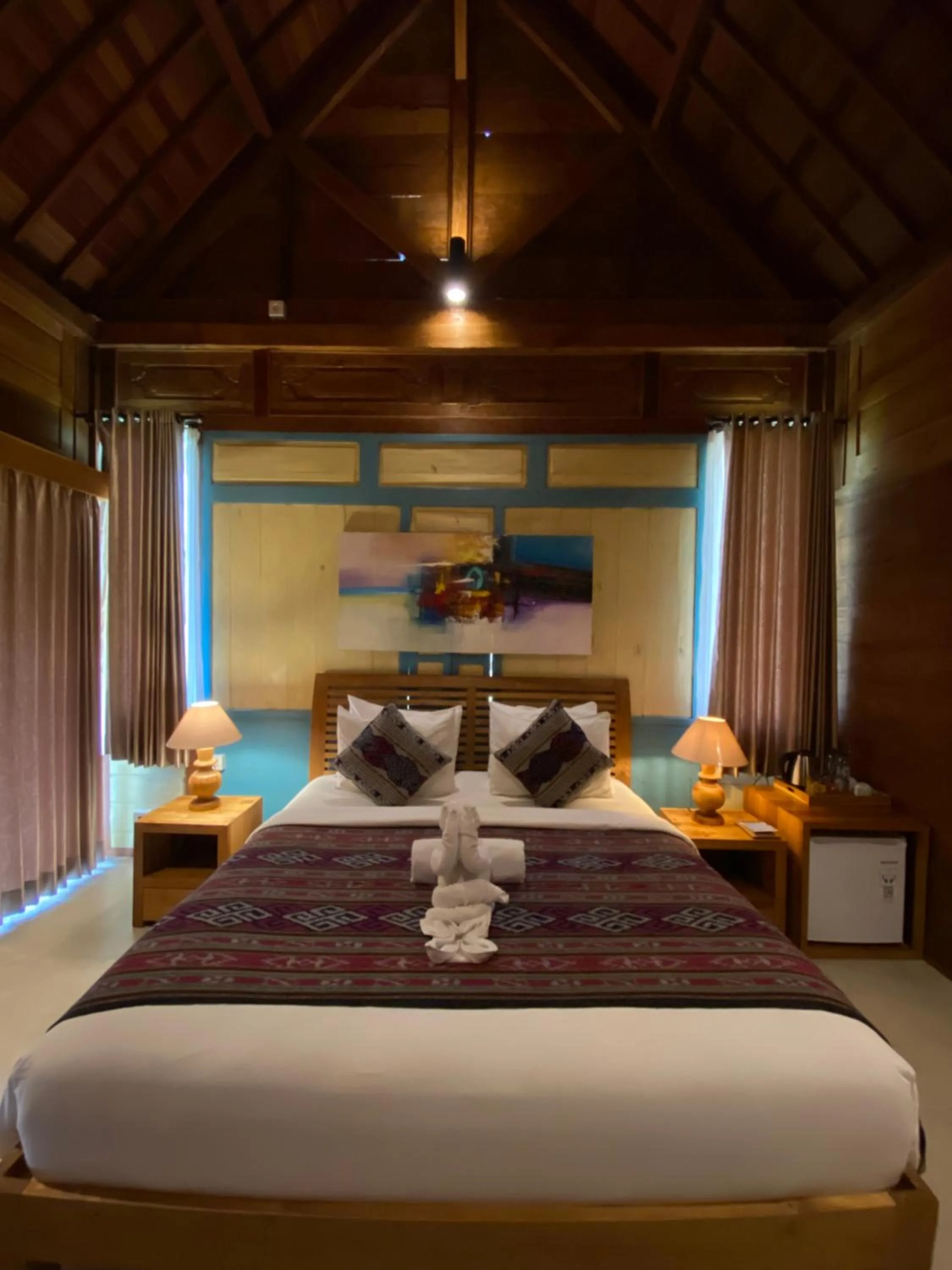 Bed in Kubu Sakian Villa and Restaurant Sidemen