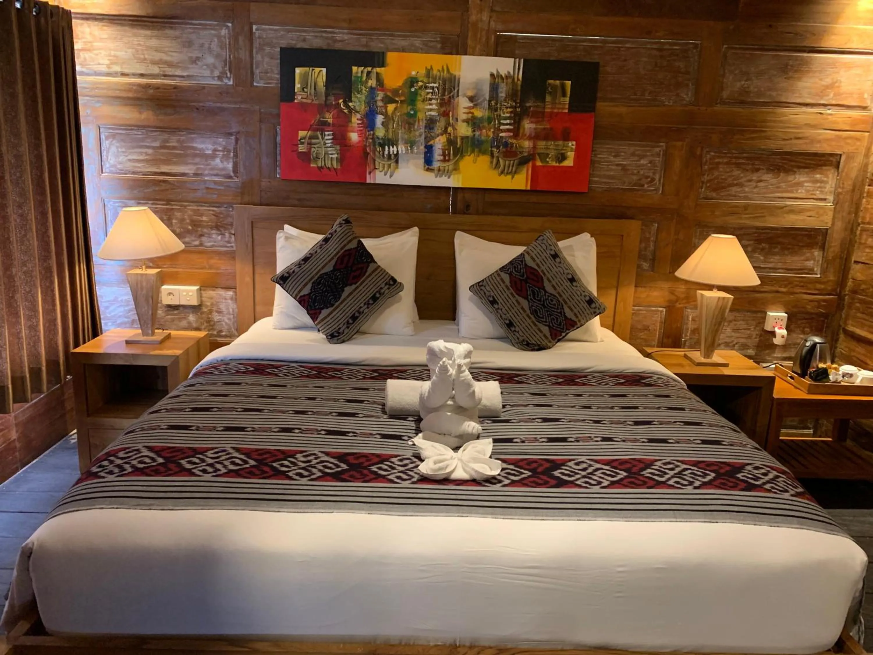 Bed in Kubu Sakian Villa and Restaurant Sidemen