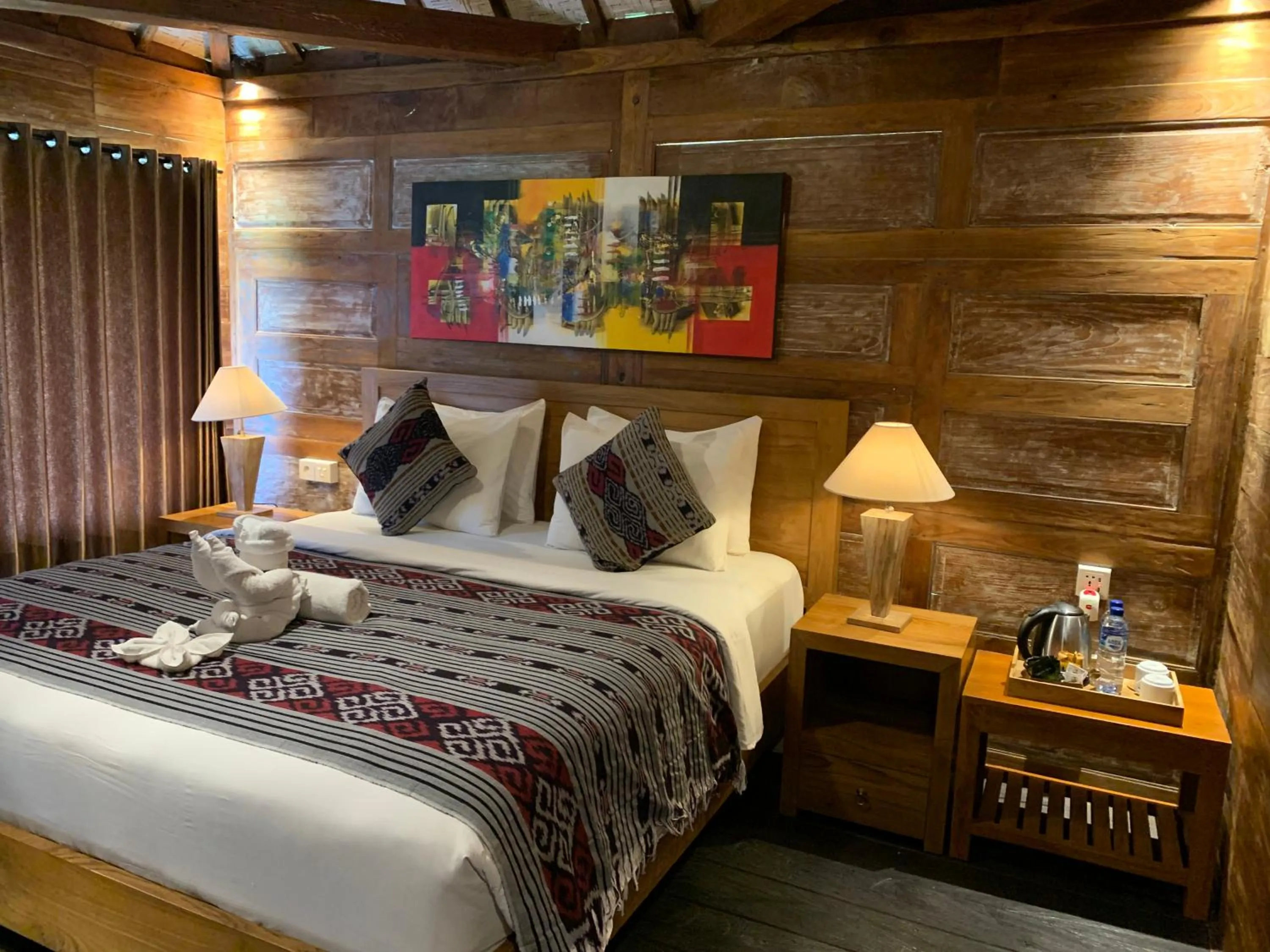 Bed in Kubu Sakian Villa and Restaurant Sidemen