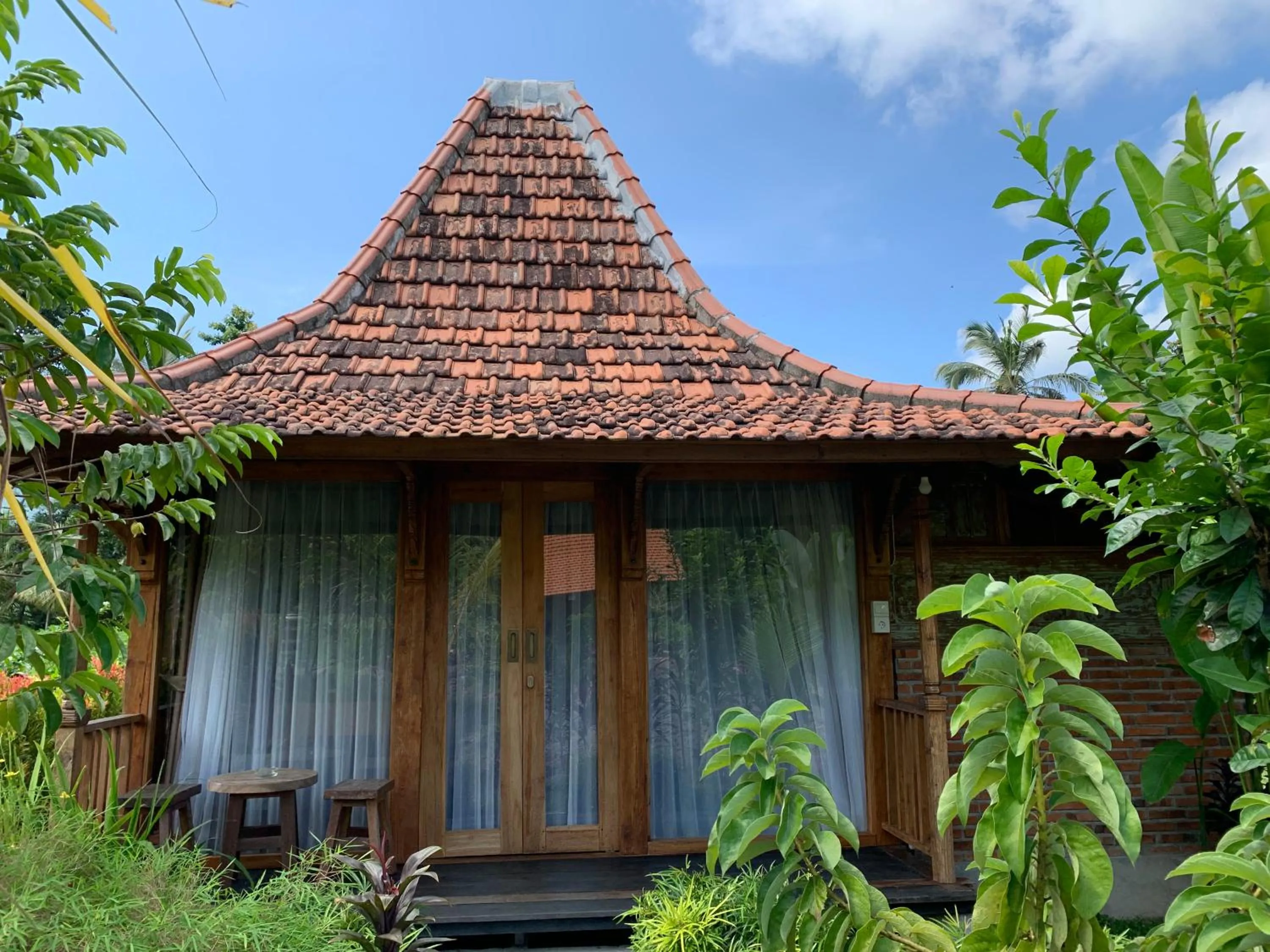 Bed in Kubu Sakian Villa and Restaurant Sidemen
