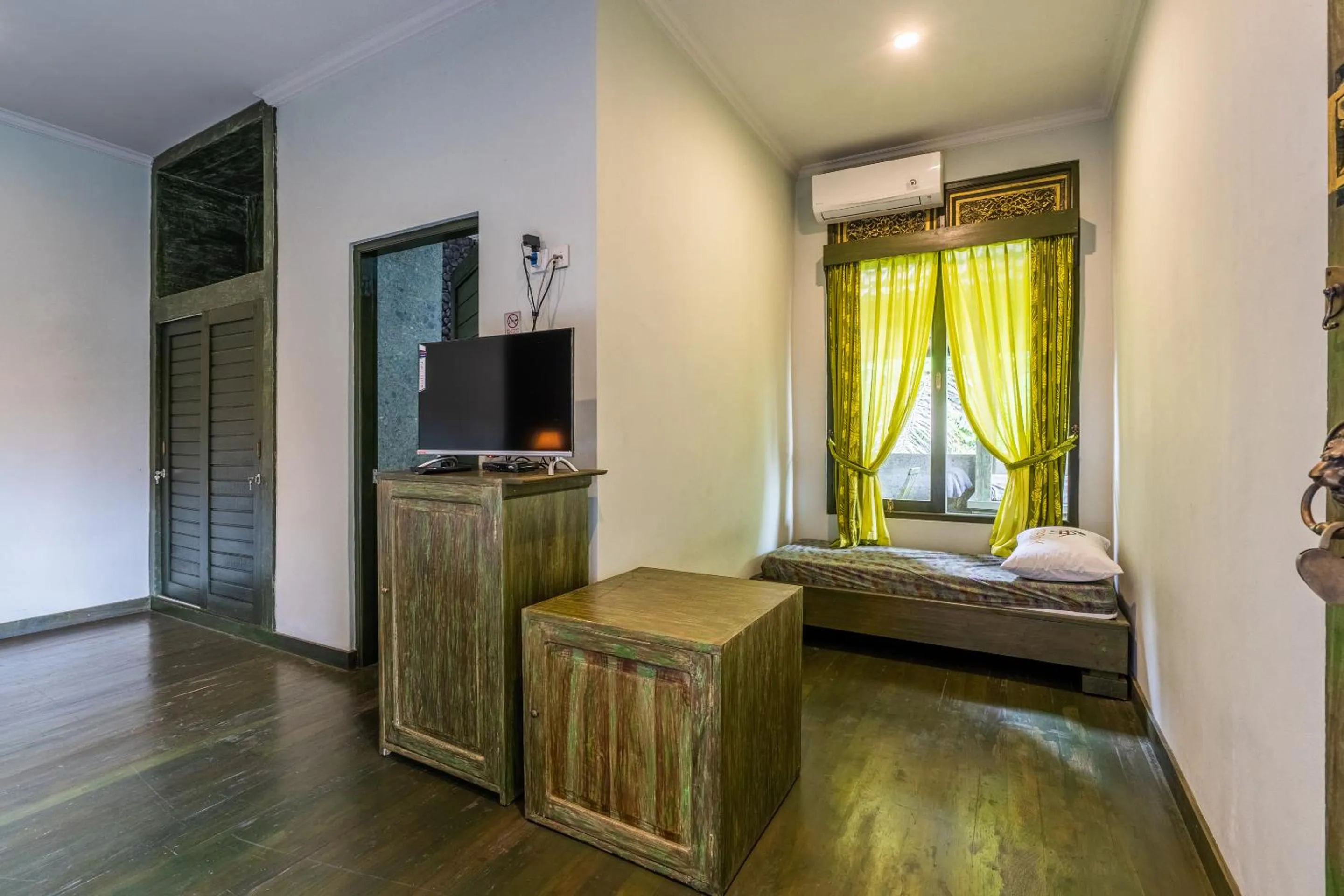 Bed in Huts Rock Ubud