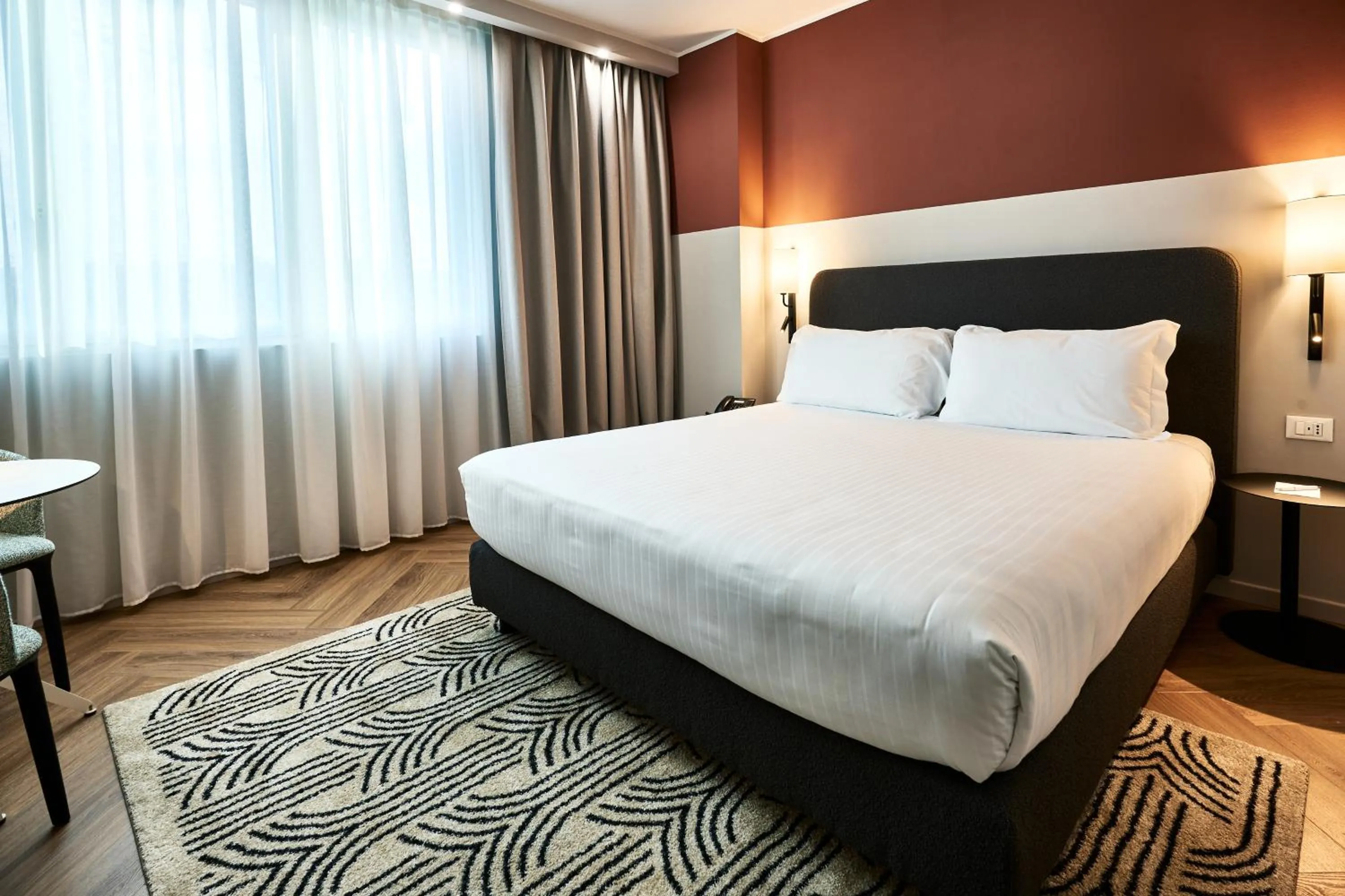 Bed in Crowne Plaza Padova by IHG