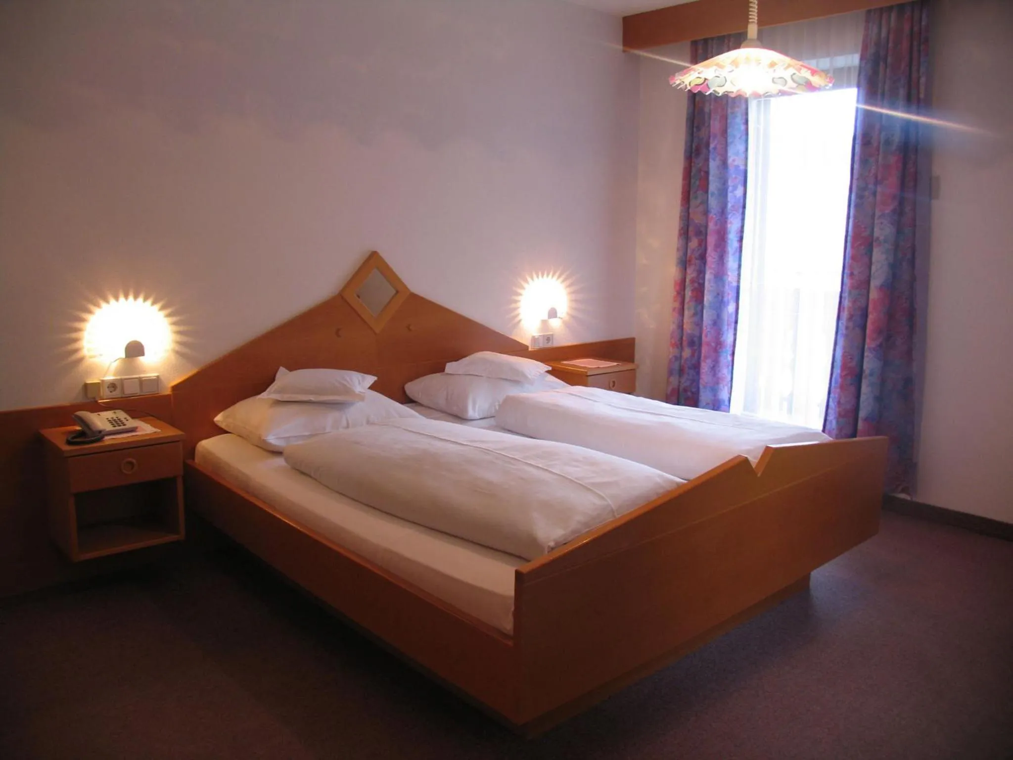 Bed in Hotel Reichegger