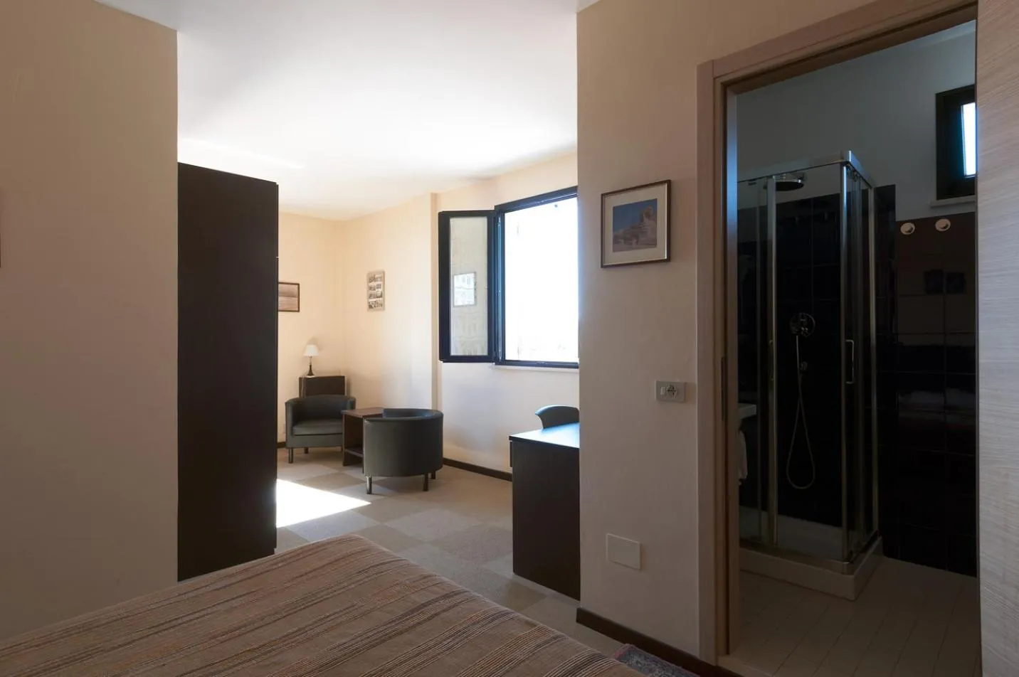 Seating area, Bed in Hotel Ancore