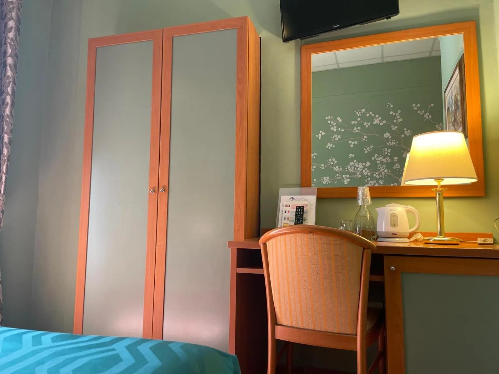 Bed in Hotel Maxim Axial